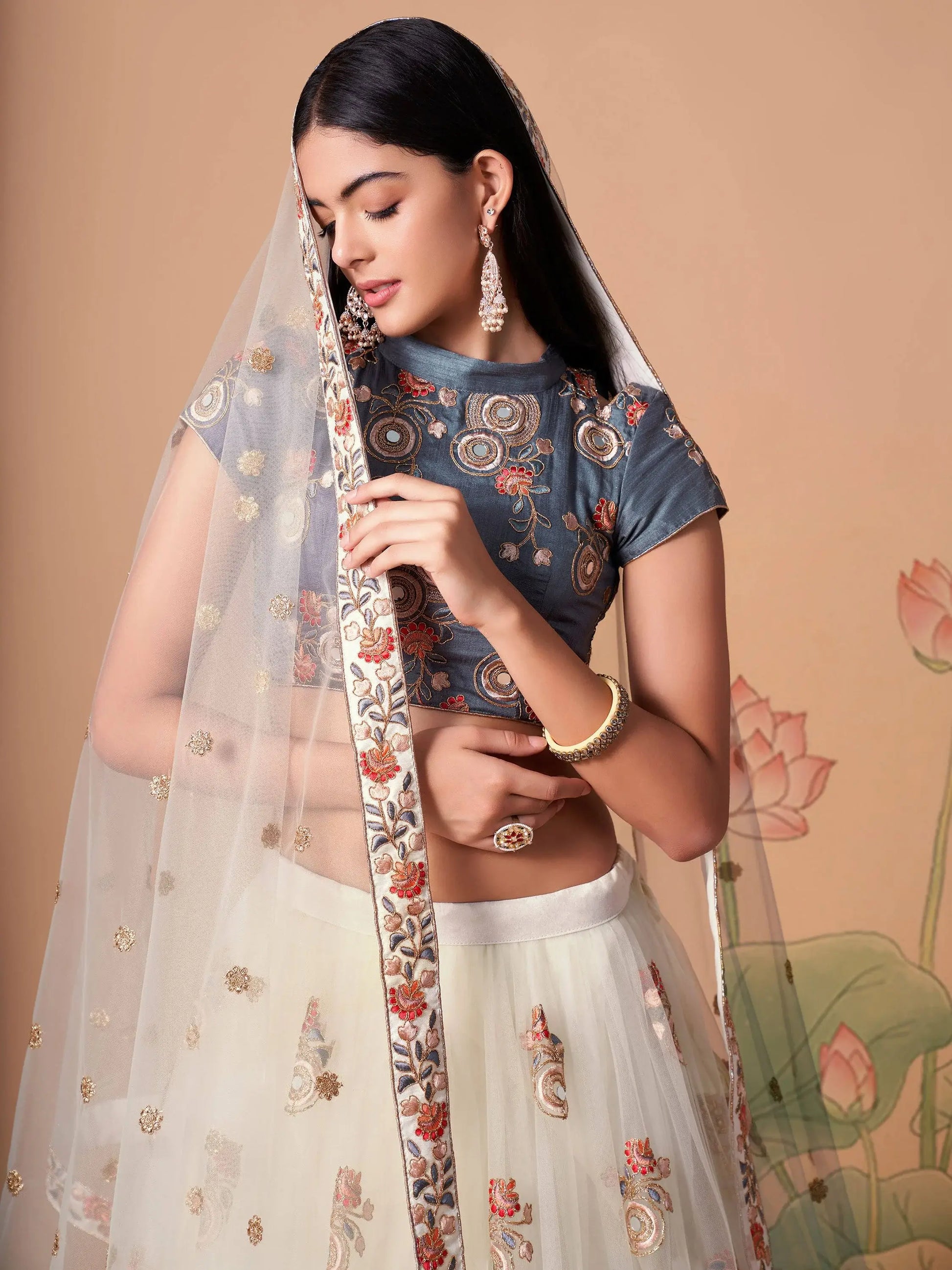 Fascinating Off-White Mirror Work Net Party Wear Lehenga Choli - Zeel Clothing