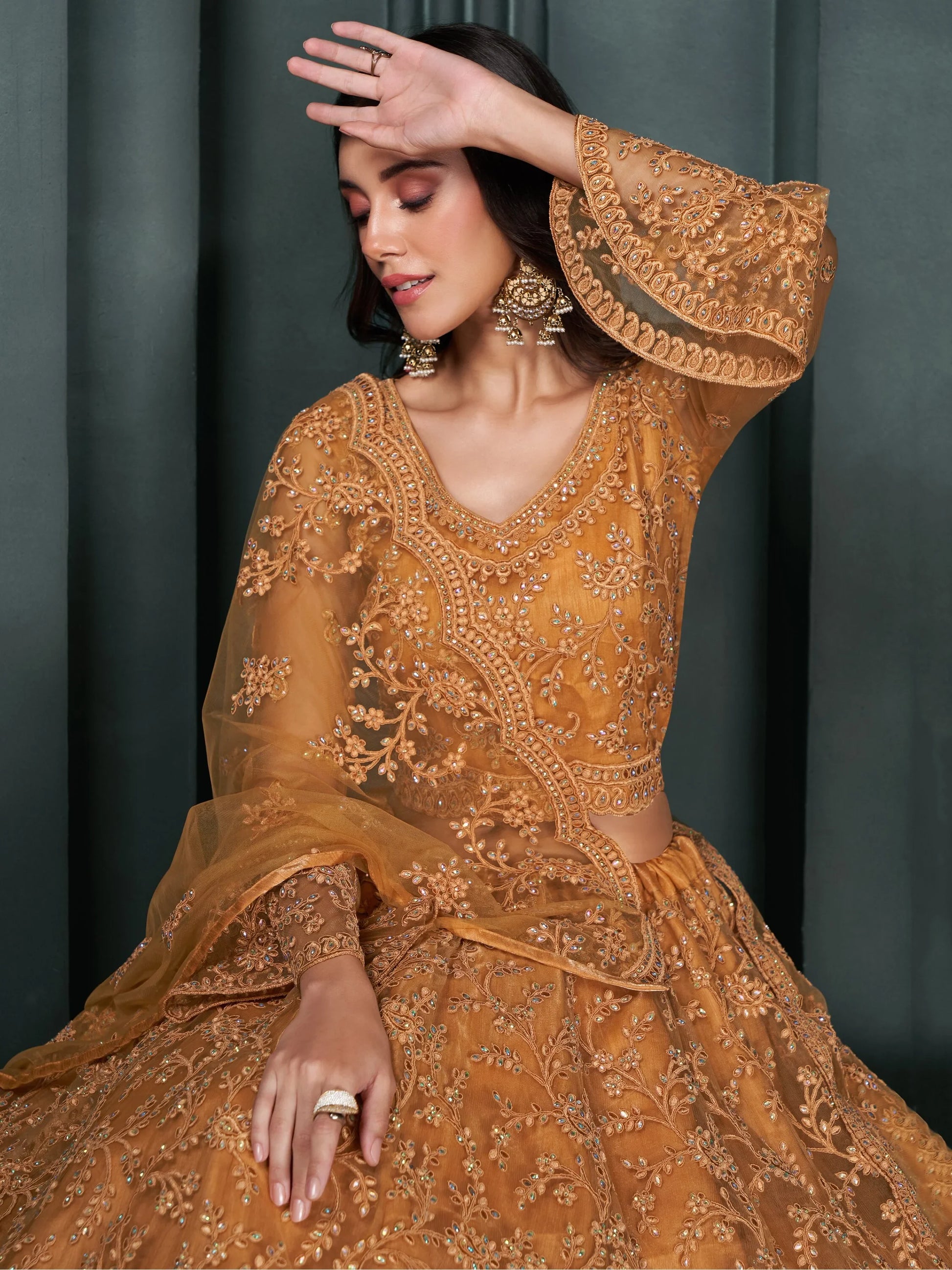 Fascinating Orange Thread Work Net Engagement Wear Lehenga Choli - Zeel Clothing