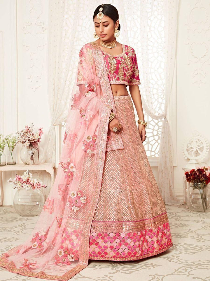 Fascinating Pink Embroidered Soft Net Wedding Wear Lehenga Choli