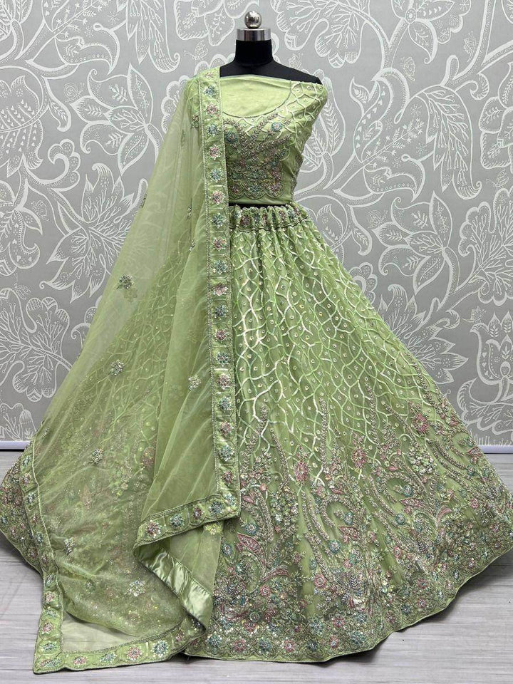 Fascinating Sea Green Sequins Net Engagement Wear Lehenga Choli - Zeel Clothing