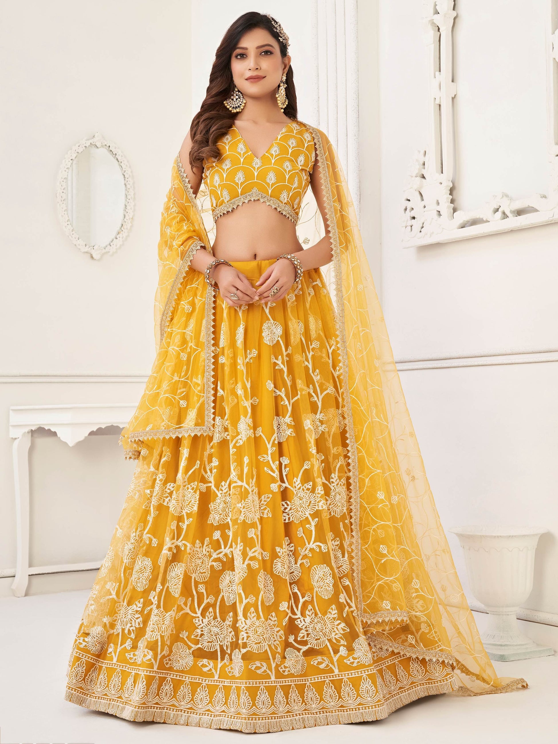 Fascinating Yellow Embroidered Net Haldi Wear Lehenga Choli - Zeel Clothing