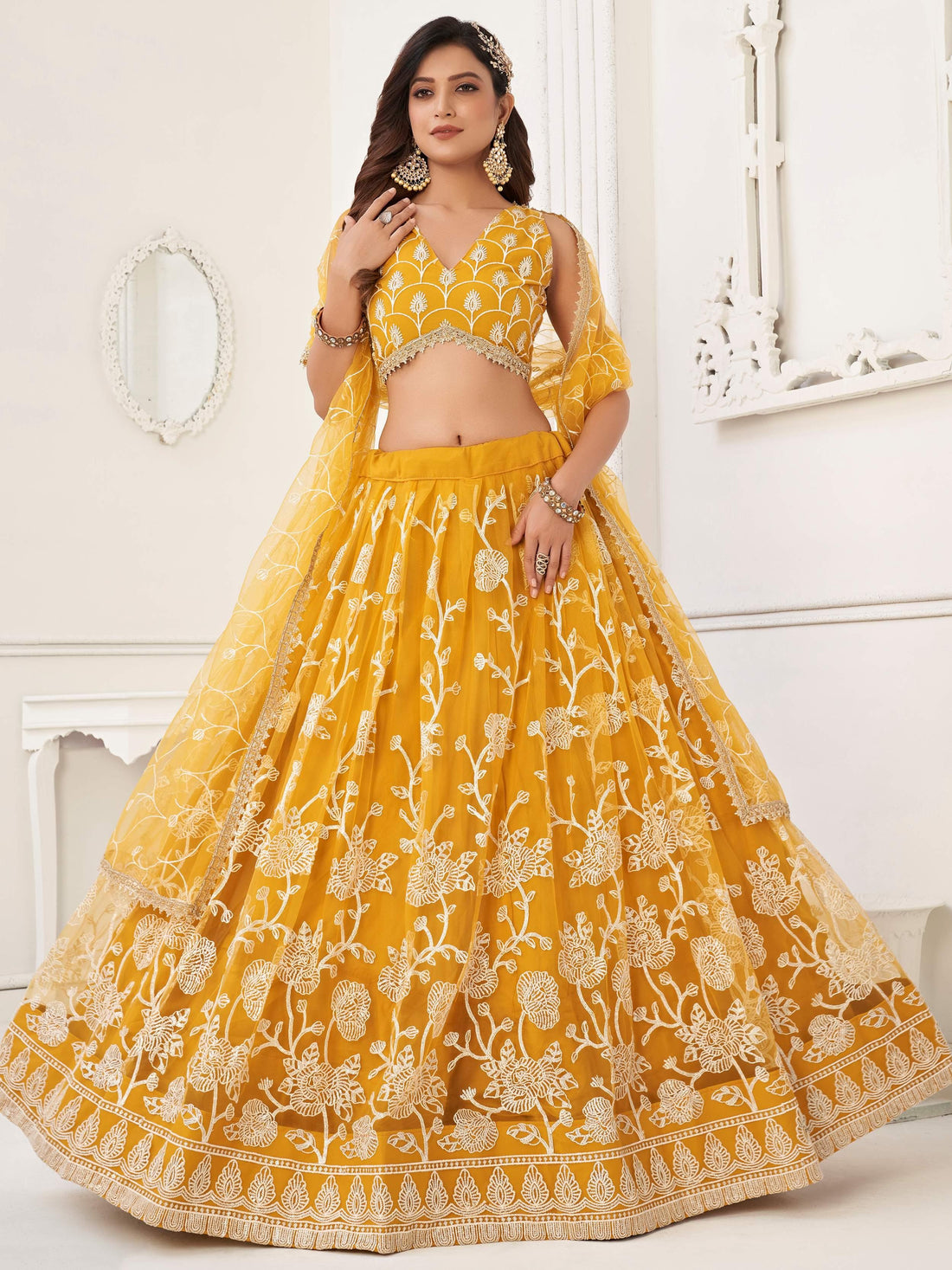 Fascinating Yellow Embroidered Net Haldi Wear Lehenga Choli - Zeel Clothing