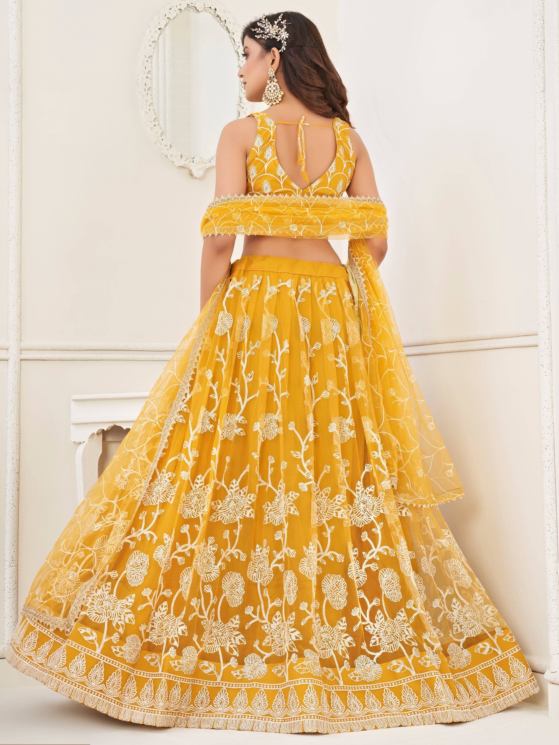 Fascinating Yellow Embroidered Net Haldi Wear Lehenga Choli - Zeel Clothing