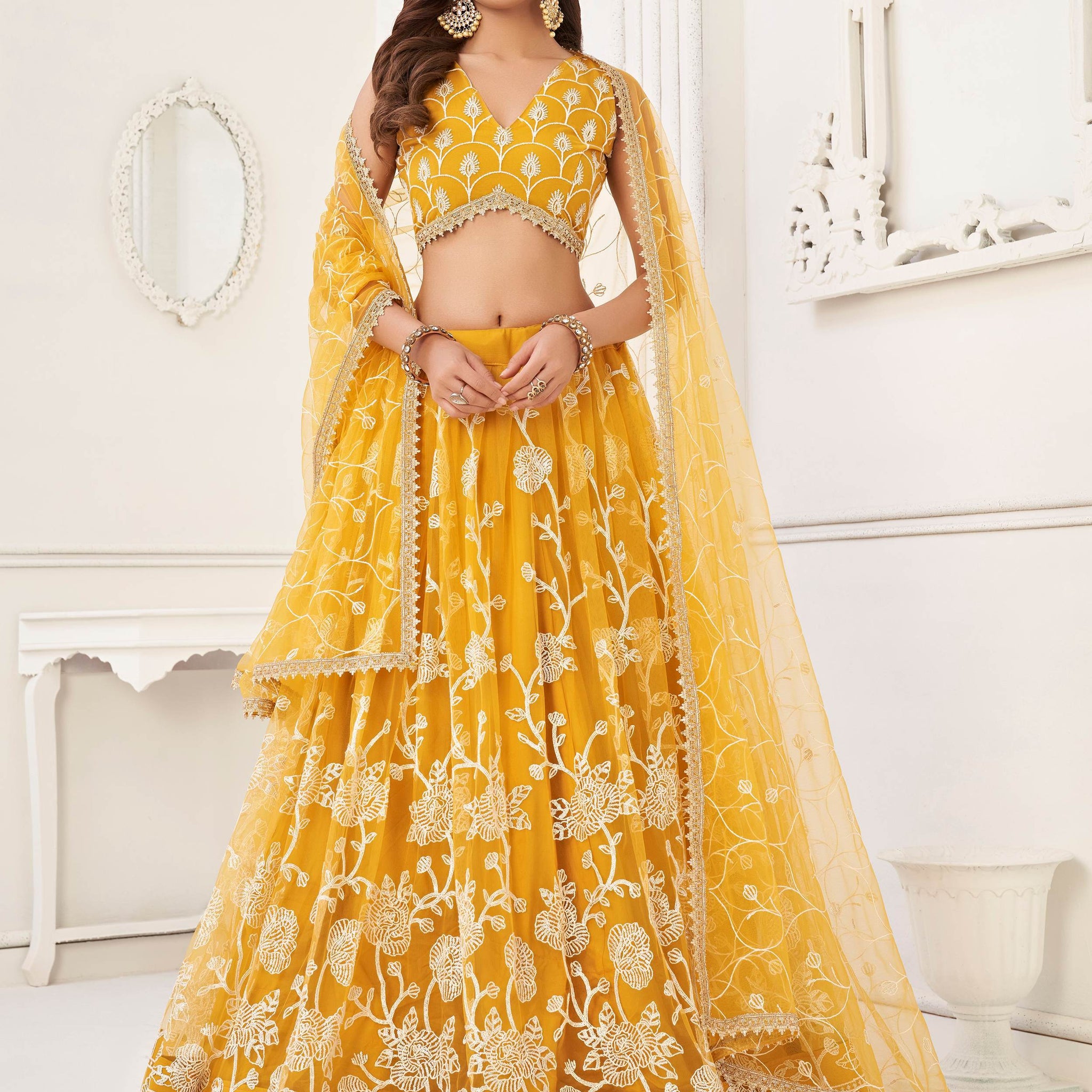 Fascinating Yellow Embroidered Net Haldi Wear Lehenga Choli - Zeel Clothing