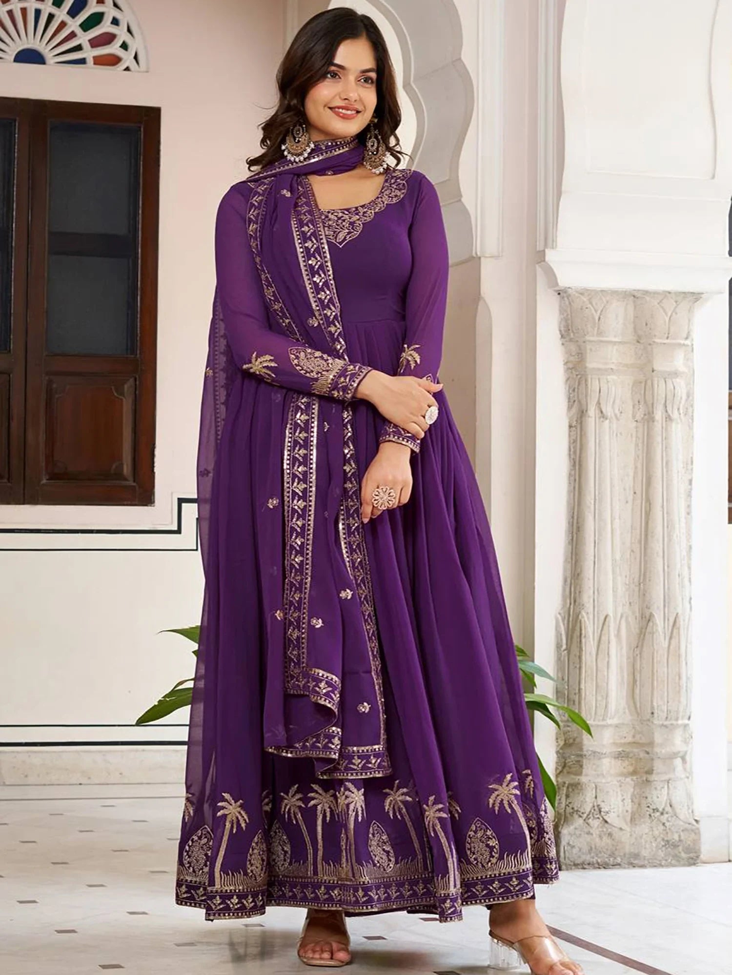 Fashionable Purple Sequins Work Georgette Festive Wear Gown