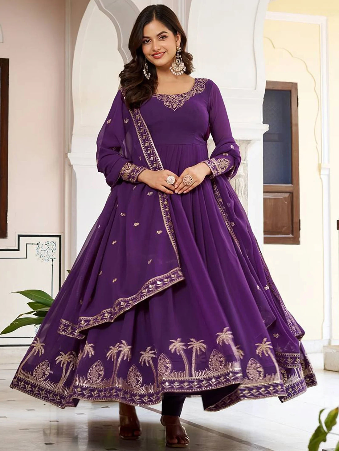 Fashionable Purple Sequins Work Georgette Festive Wear Gown