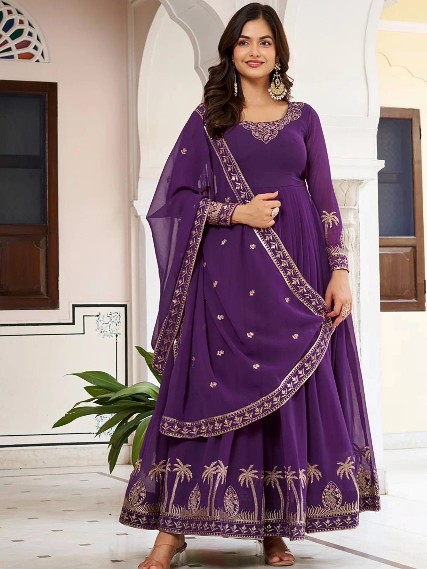 Fashionable Purple Sequins Work Georgette Festive Wear Gown