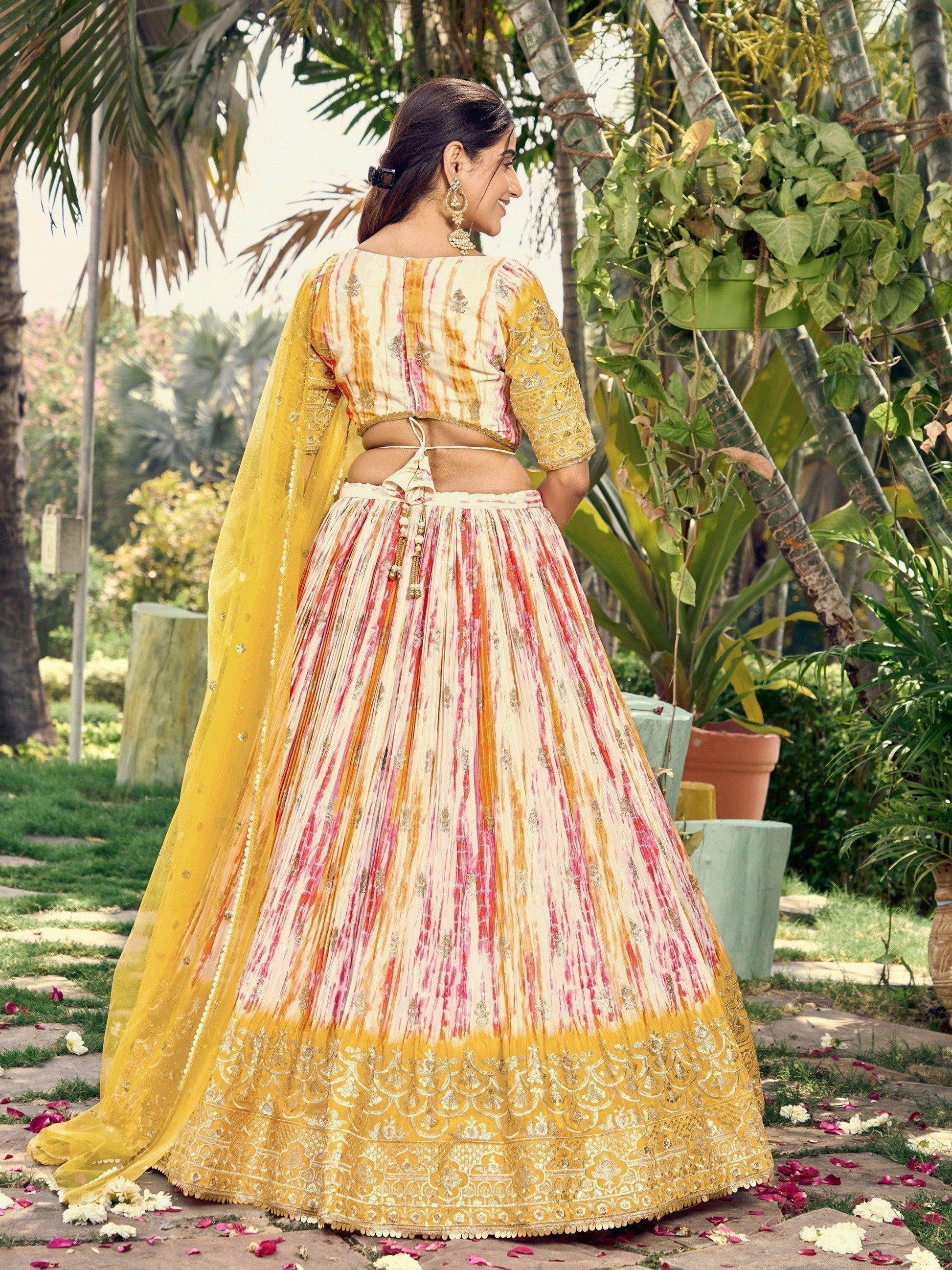 Fetching White & Yellow Digital Printed Chinon Haldi Wear Lehenga Choli - Zeel Clothing