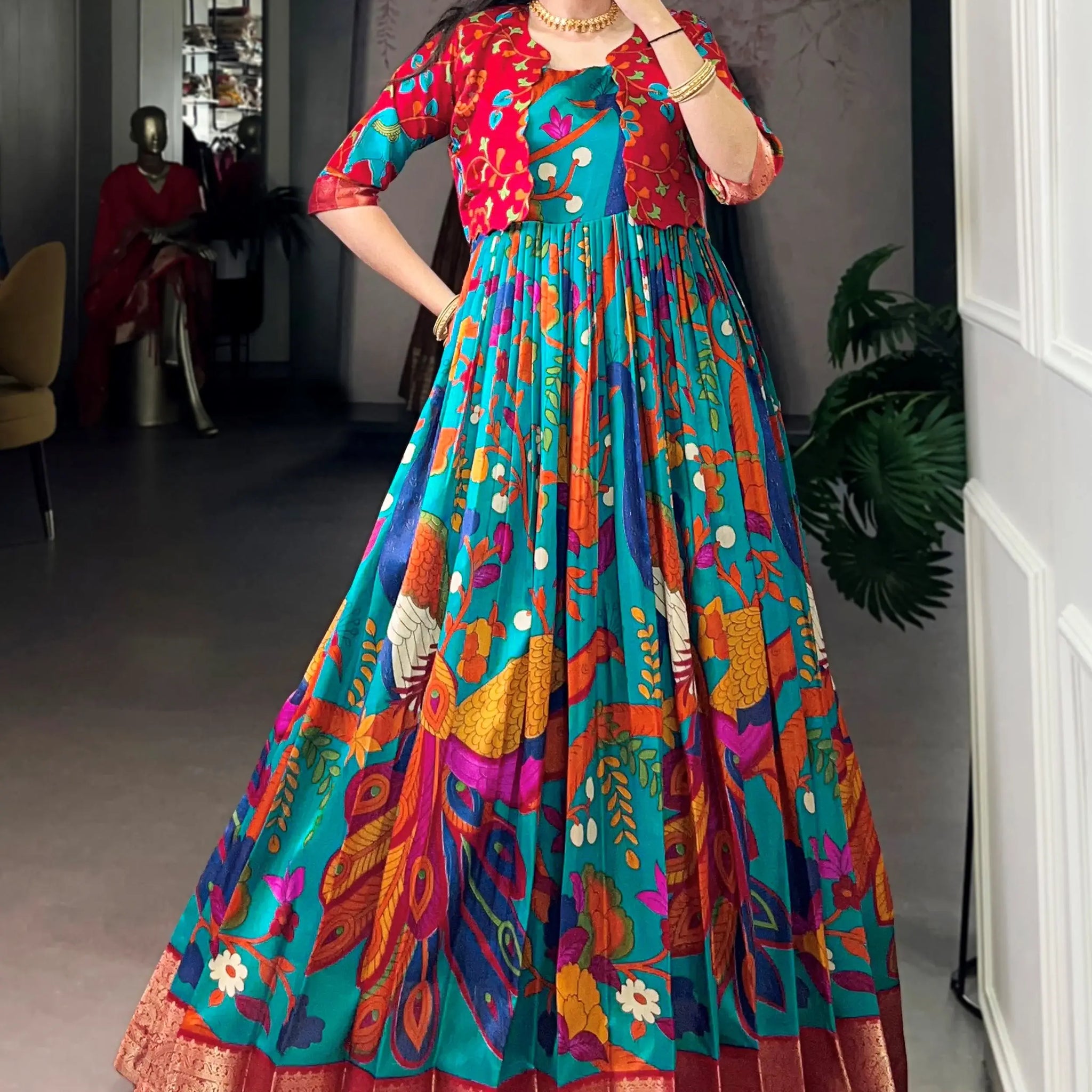 Lovely Teal Blue Kalamkari Print Tussar Silk Festive Wear Gown With Jacket