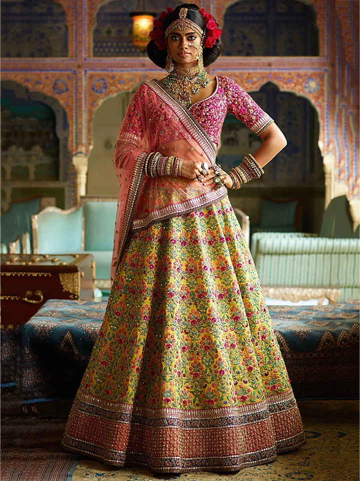 Flamboyant Yellow-Pink Colored Bridal wear Embroidered Lehenga Choli
