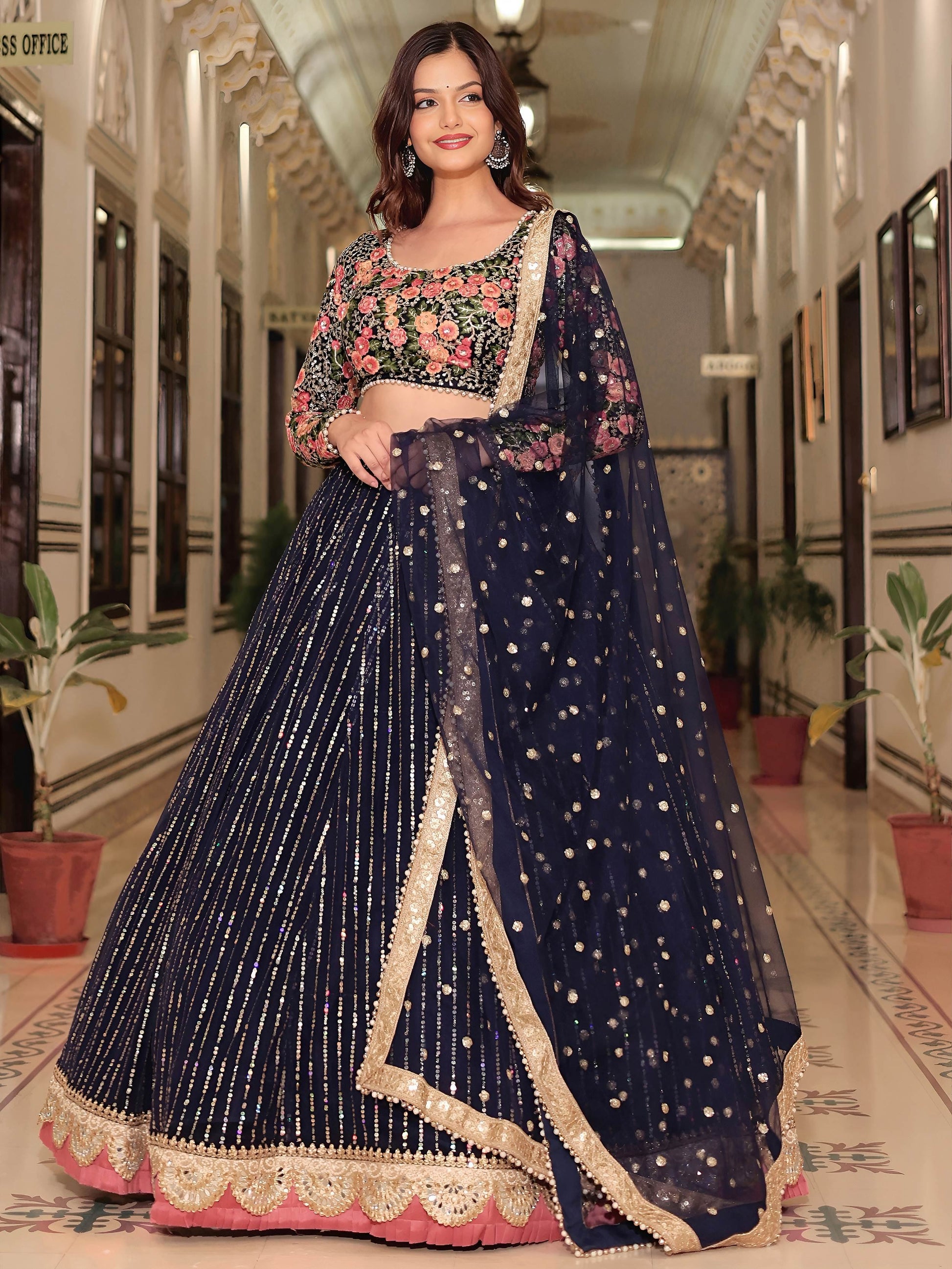 Glamorous Navy Blue Floral Embroidery Net Engagement Wear Lehenga With Blouse