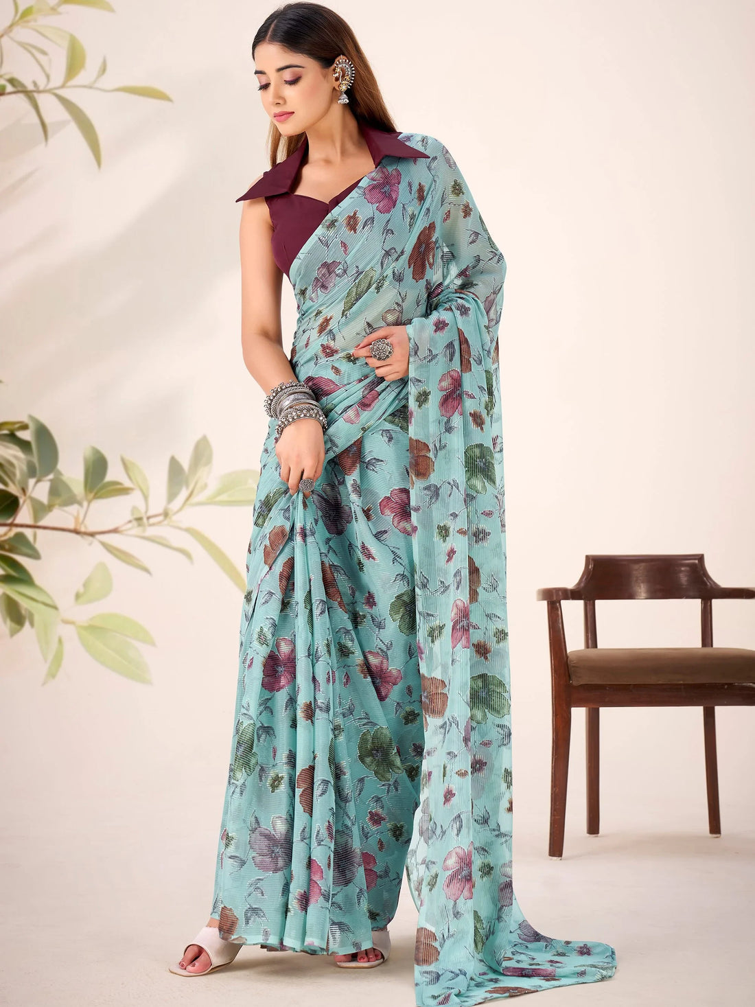 Glamorous Sea Green Floral Printed Brasso Festivals Wear Saree