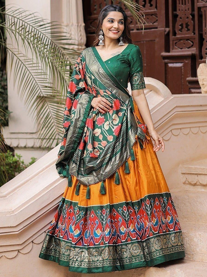 Glorious Mustard Patola Printed Silk Festival Wear Lehenga Choli