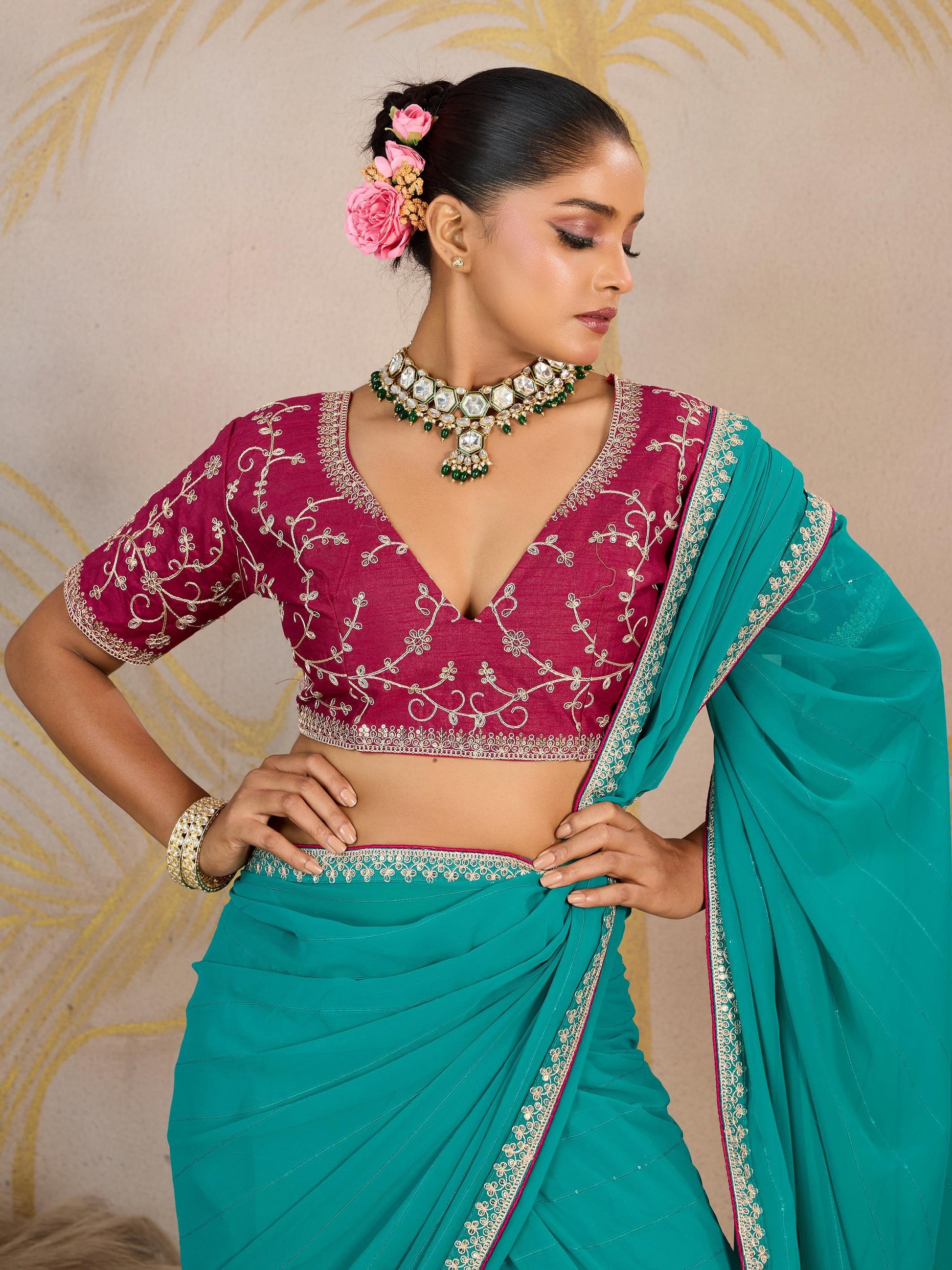 Glorious Turquoise Zari Border Work Georgette Traditional Saree With Blouse