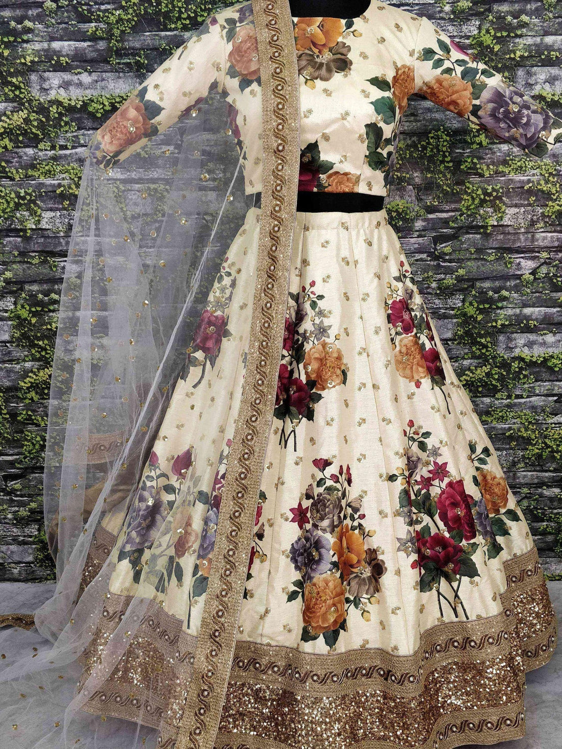Gorgeous Cream Colored Partywear Designer Embroidered Lehenga Choli