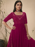Elegant magenta embroidered anarkali dress with gold detailing, perfect for festive occasions and women's fashion.