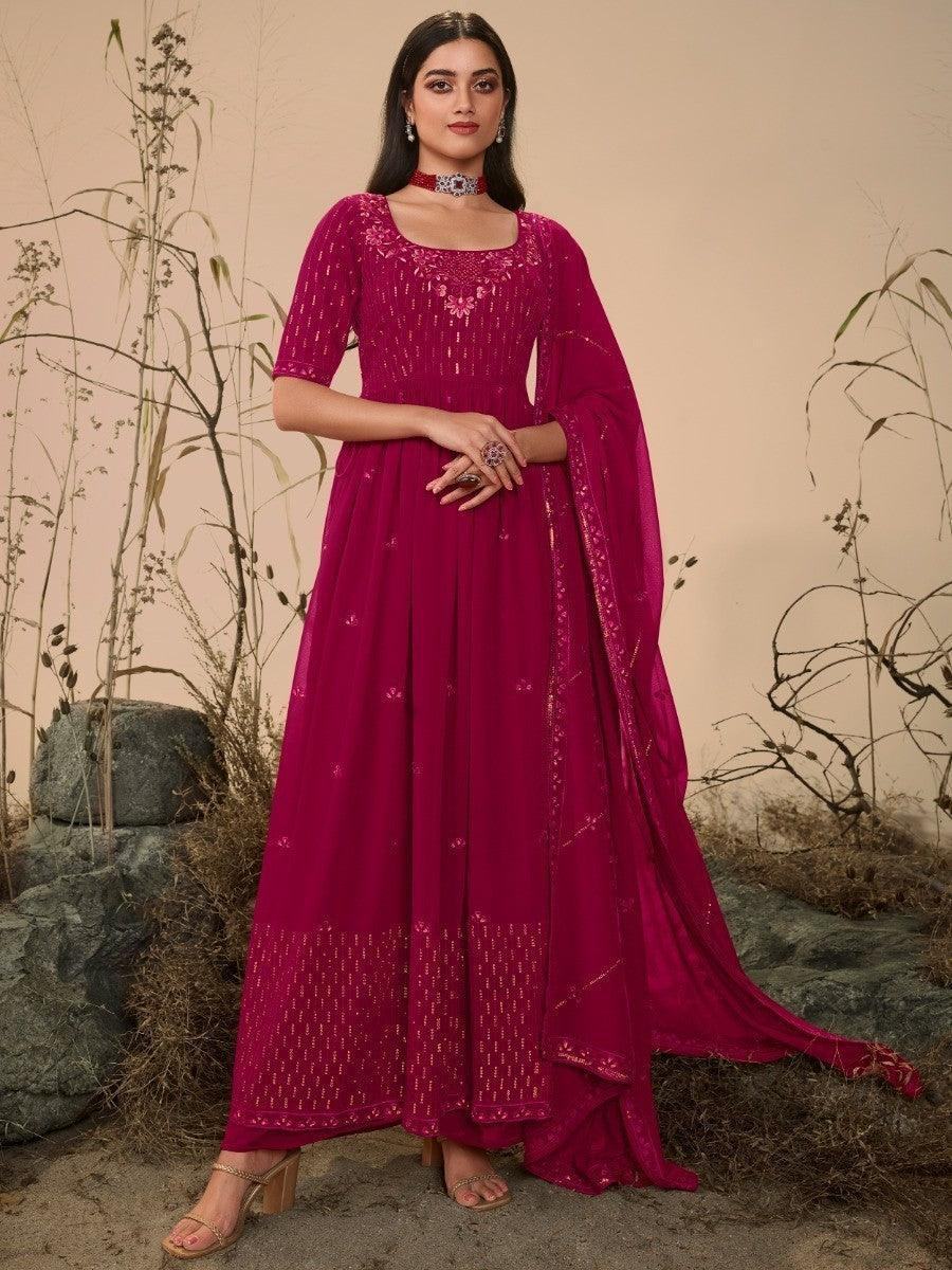 Elegant magenta anarkali suit with gold embroidery, perfect for women's fashion events