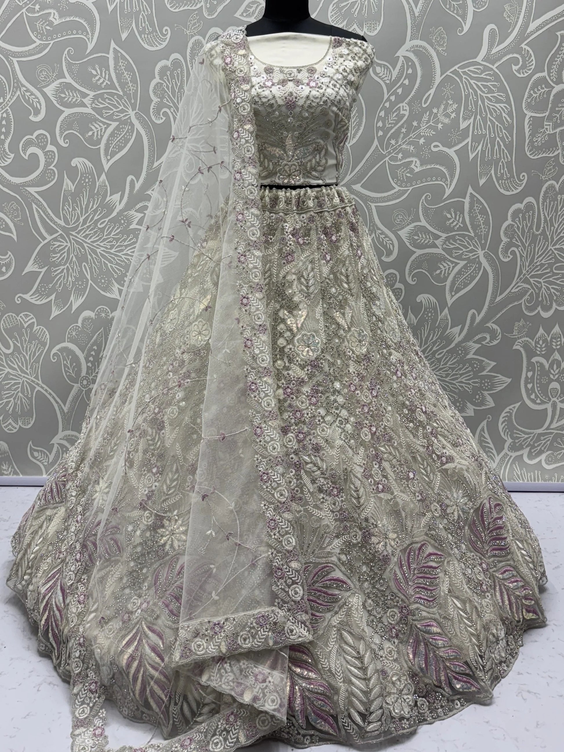 Gorgeous White Zircon Work Net Sangeet Wear Lehenga Choli With Dupatta - Zeel Clothing