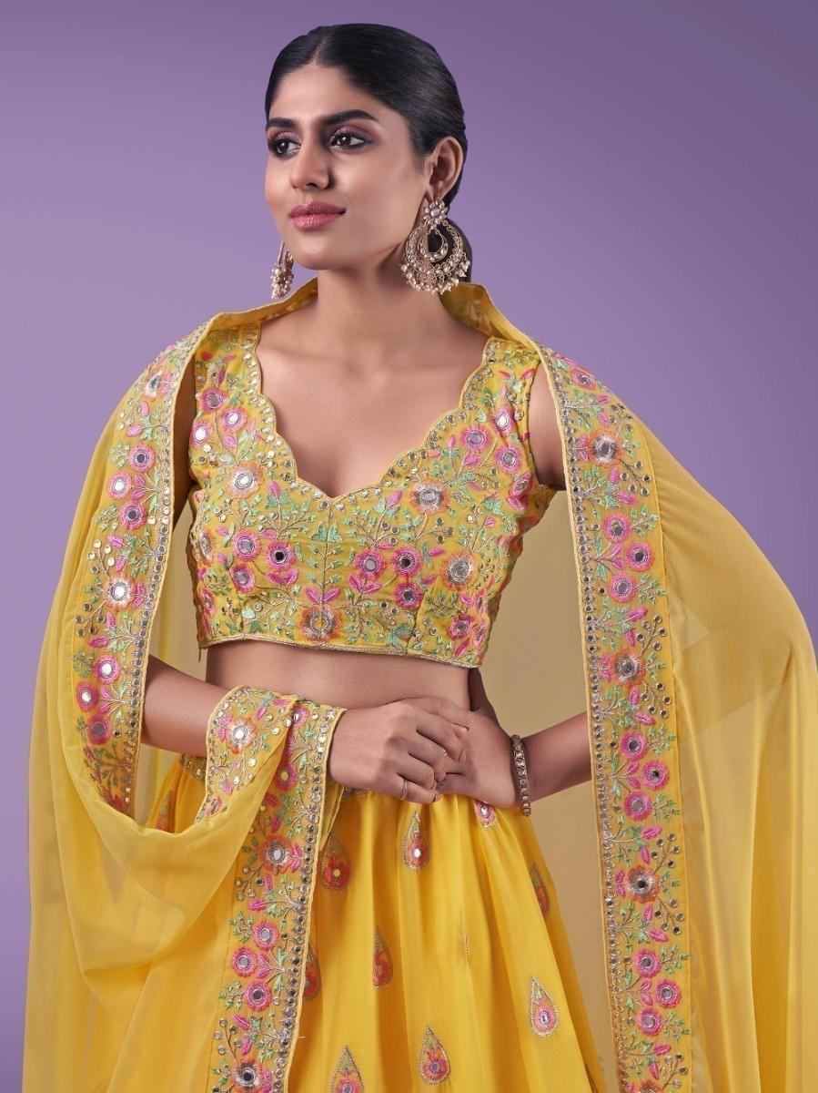 Yellow floral embroidered lehenga choli with dupatta, perfect for festive occasions and weddings