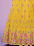 Yellow embroidered lehenga skirt with floral and mirror work, perfect for festive occasions
