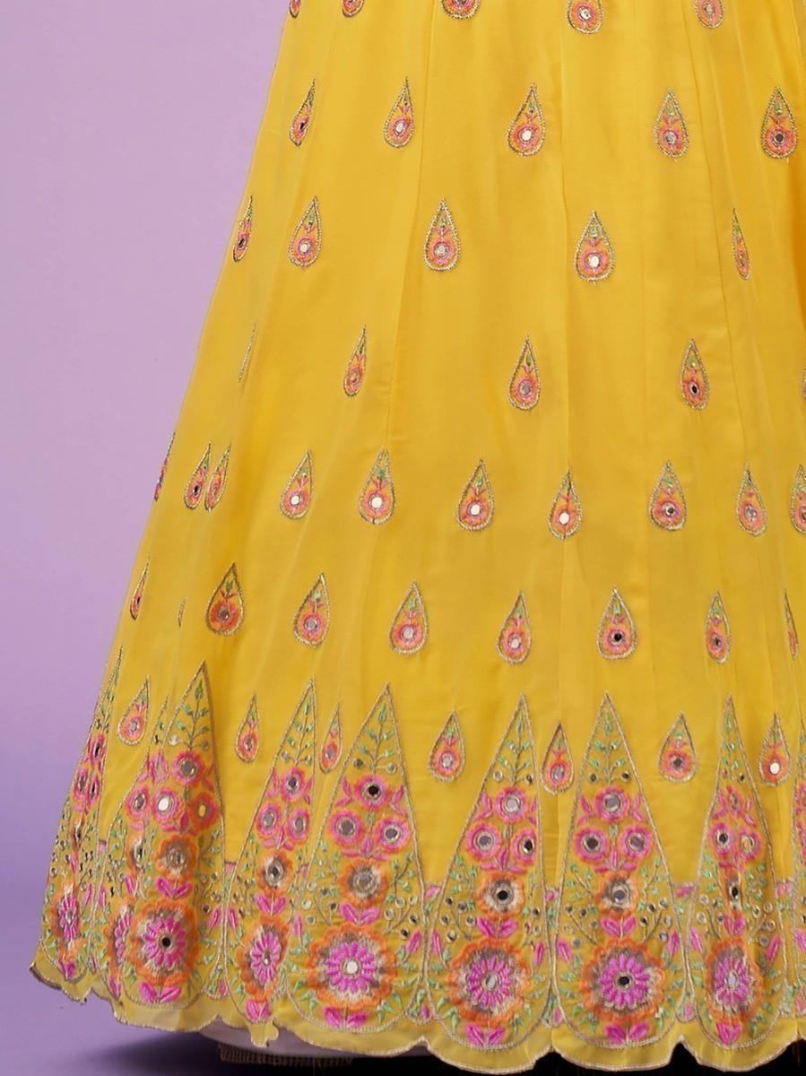 Yellow embroidered lehenga skirt with floral and mirror work, perfect for festive occasions