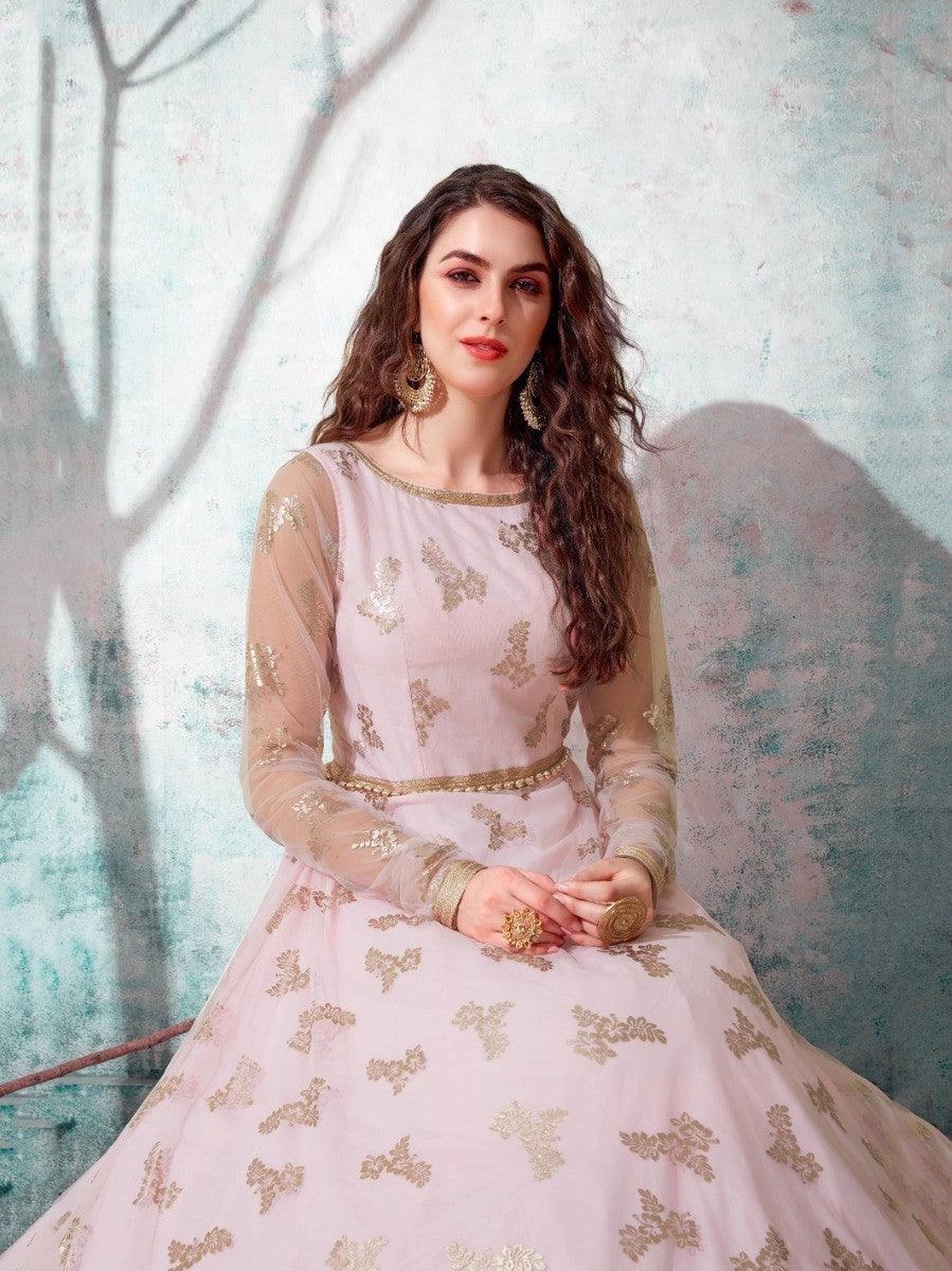 Pink embroidered anarkali gown with gold detailing, sheer sleeves, and matching jewelry for women's fashion