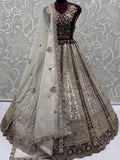 Great Off-White Stone Work Net Wedding Wear Lehenga Choli With Dupatta