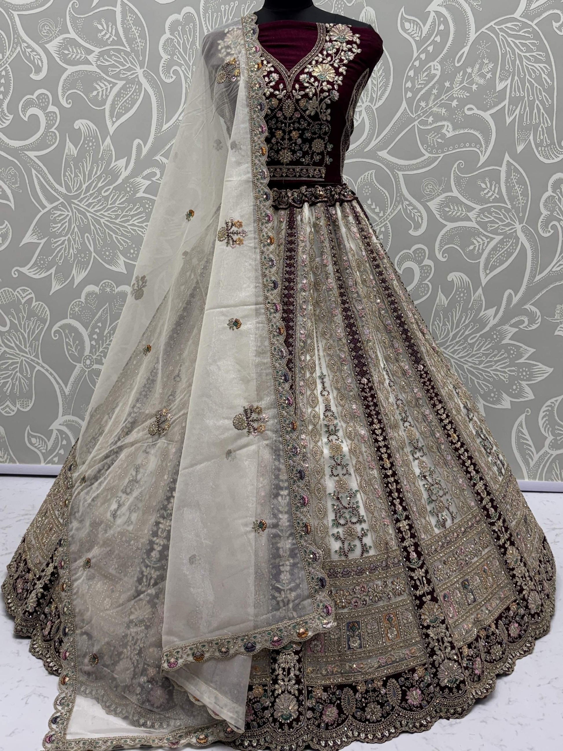 Great Off-White Stone Work Net Wedding Wear Lehenga Choli With Dupatta