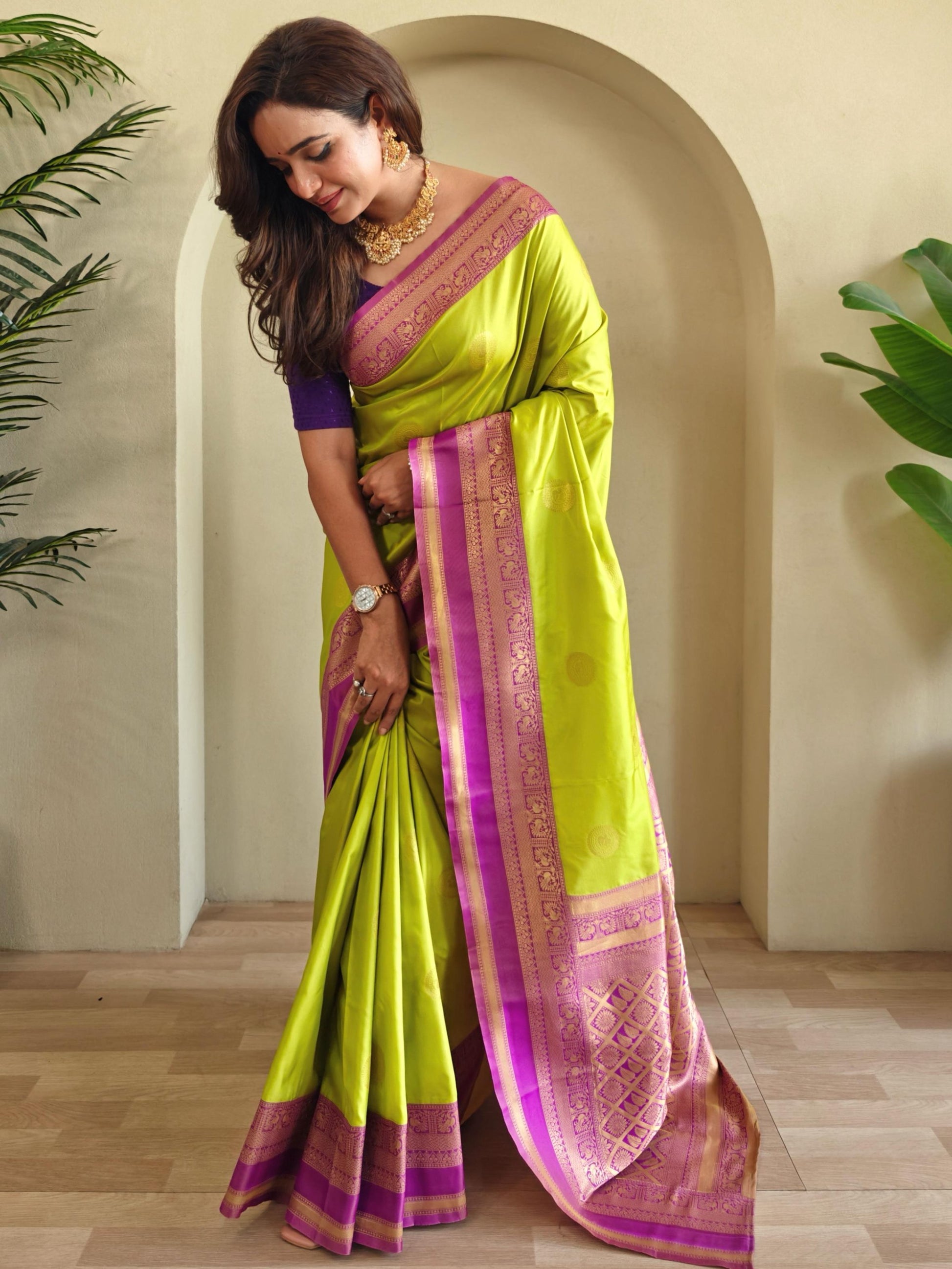 Enchanting Parrot Green Zari Weaving Silk Event Wear Saree With Blouse