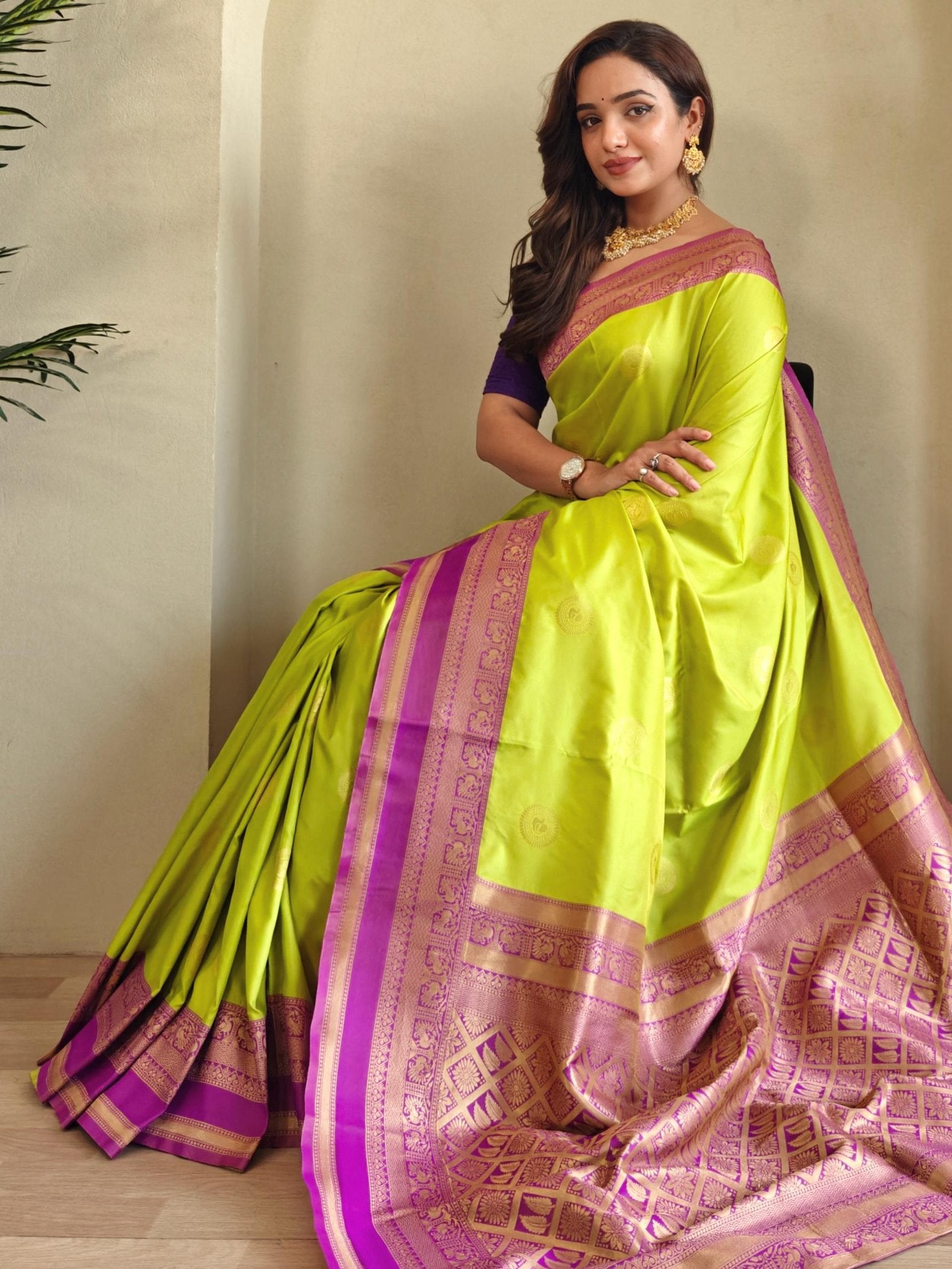 Enchanting Parrot Green Zari Weaving Silk Event Wear Saree With Blouse
