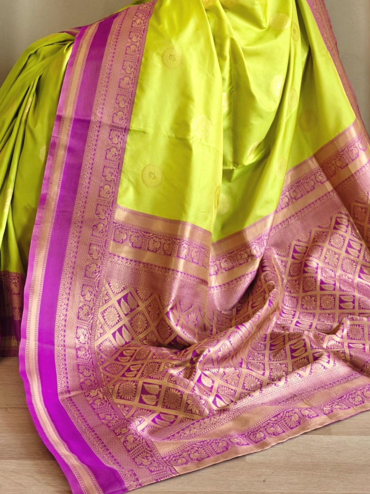Enchanting Parrot Green Zari Weaving Silk Event Wear Saree With Blouse