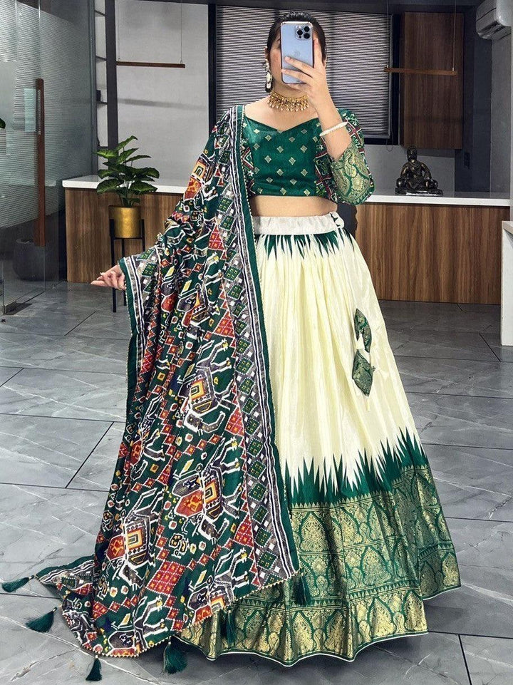 Fancified Off-White & Green Patola Print Silk Lehenga Choli With Dupatta