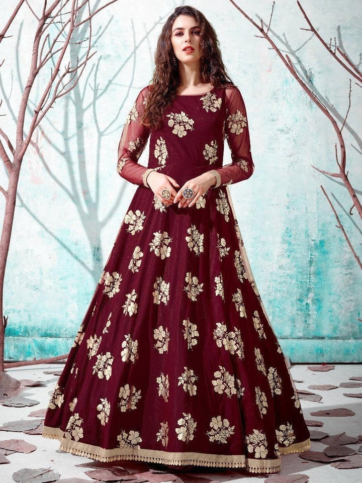 Hypnotic Maroon Foil Work Net Party Wear Long Gown