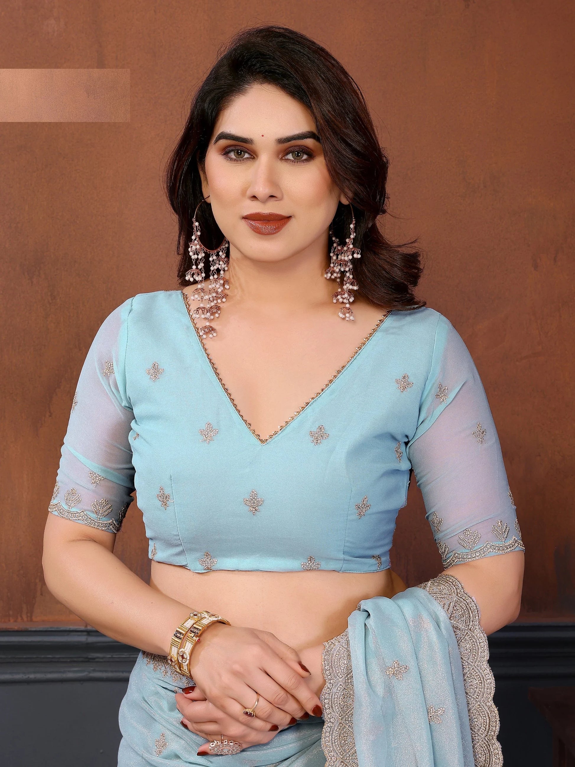 Enchanting Sky Blue Embroidered Georgette Traditional Saree With Blouse