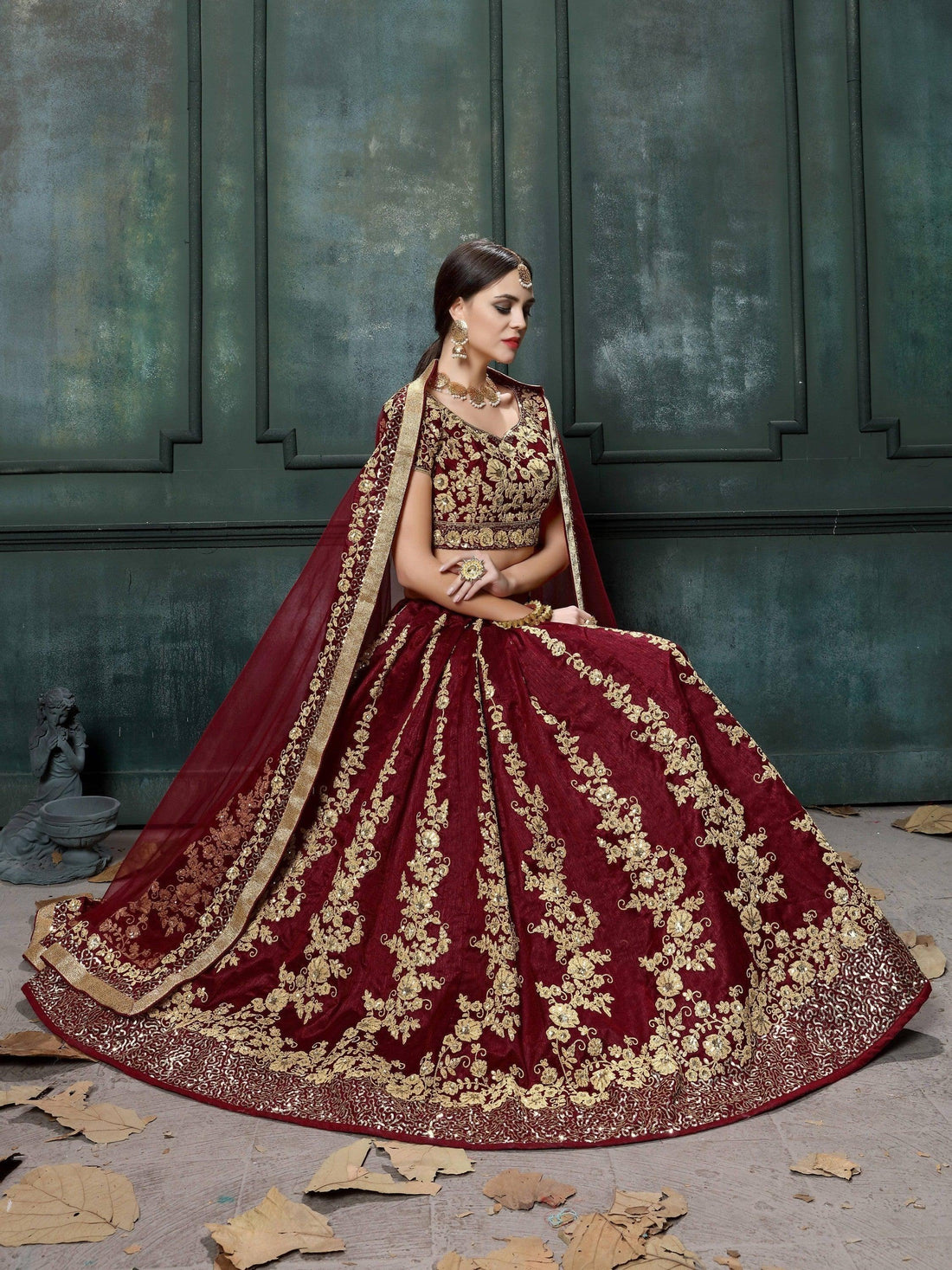 Impressive Maroon Colored Designer Partywear Raw Silk Lehenga Choli