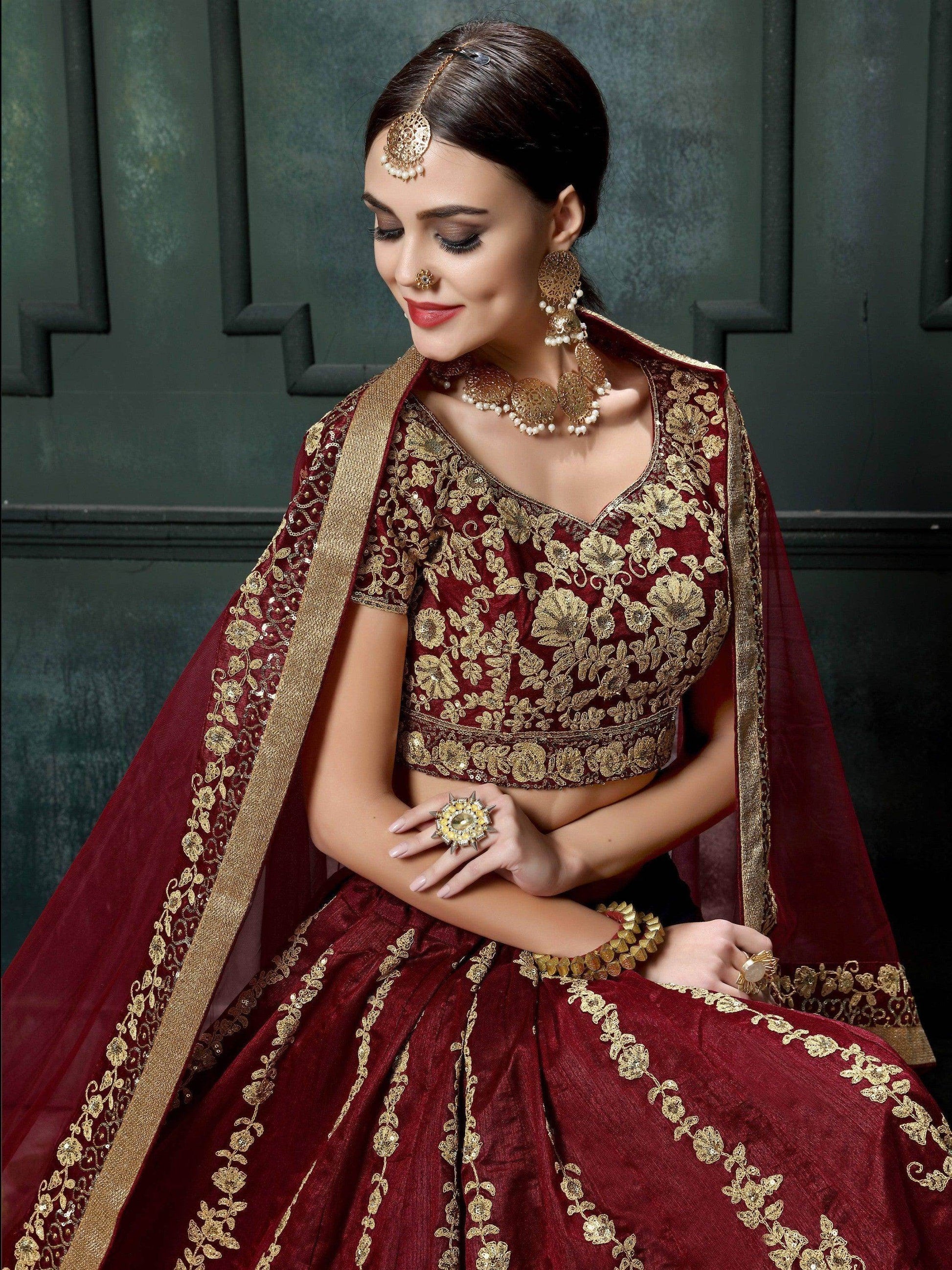 Impressive Maroon Colored Designer Partywear Raw Silk Lehenga Choli - Zeel Clothing
