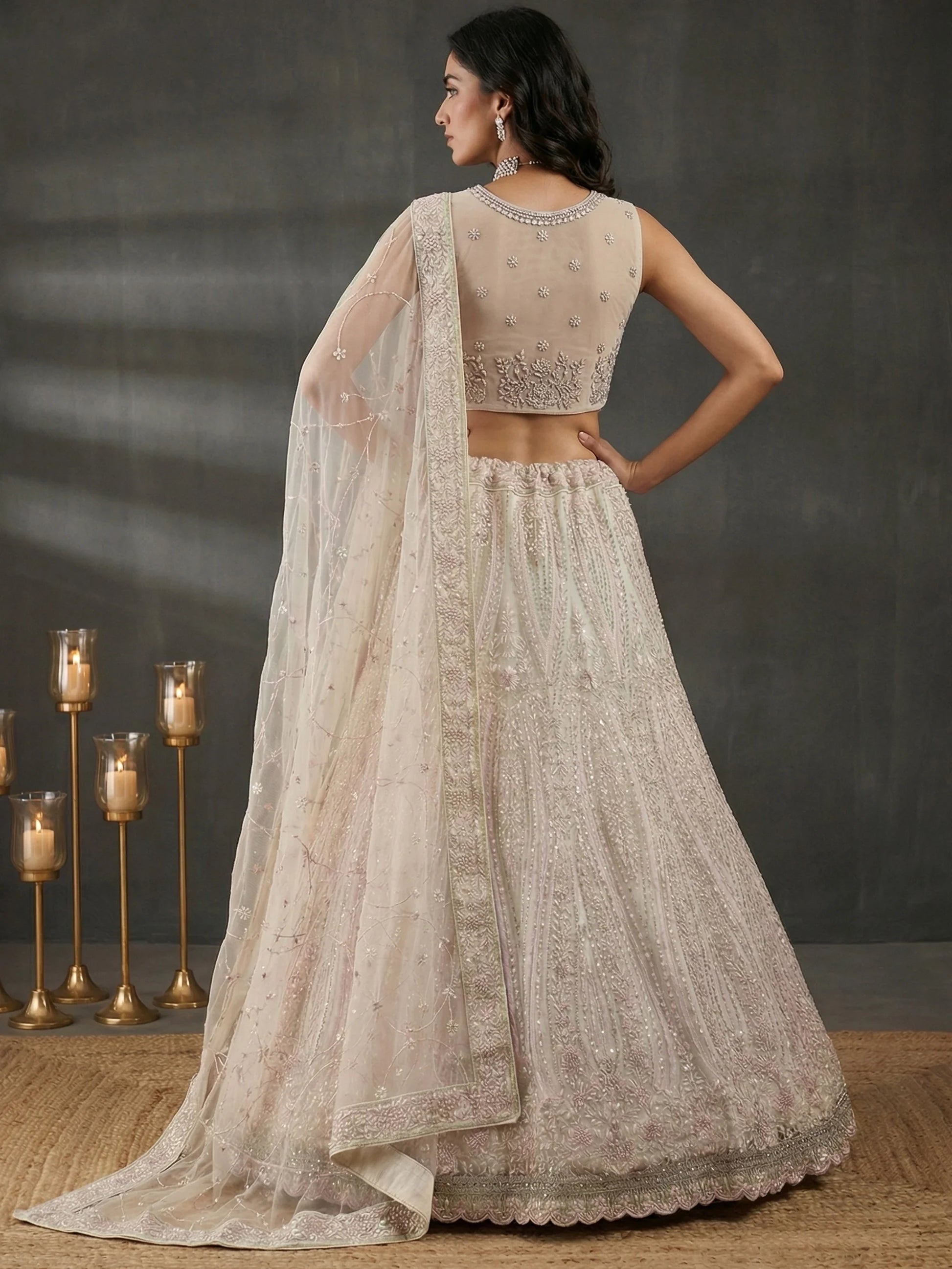 Impressive White Dori Embroidery Net Reception Wear Lehenga Choli