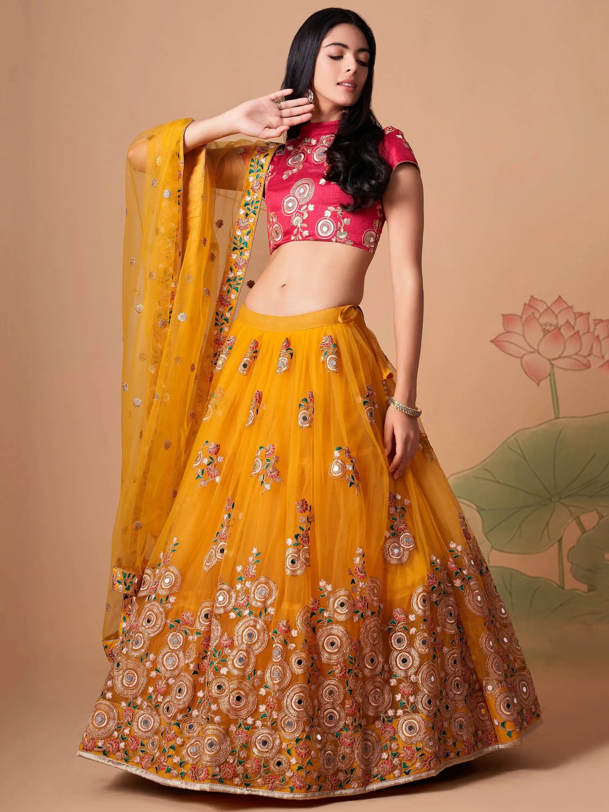 Impressive Yellow Mirror Work Net Reception Wear Lehenga Choli - Zeel Clothing