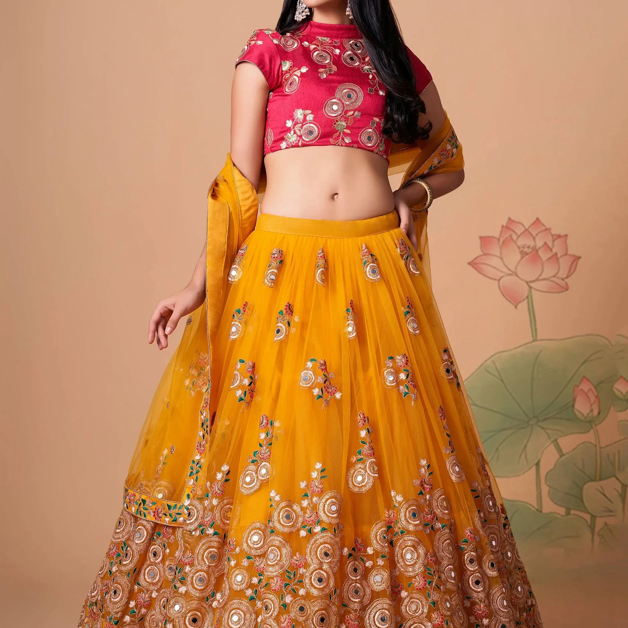 Impressive Yellow Mirror Work Net Reception Wear Lehenga Choli - Zeel Clothing