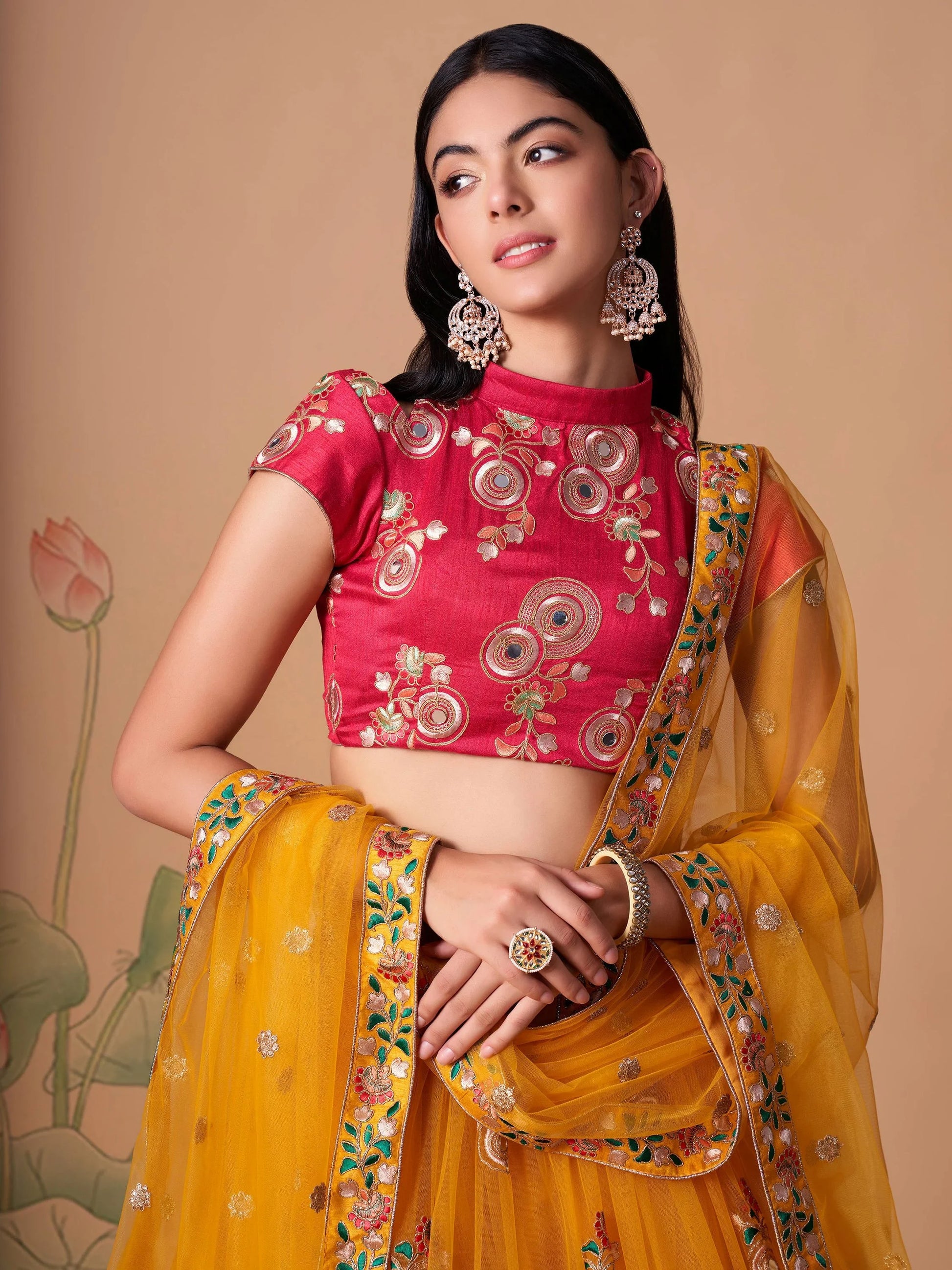 Impressive Yellow Mirror Work Net Reception Wear Lehenga Choli - Zeel Clothing