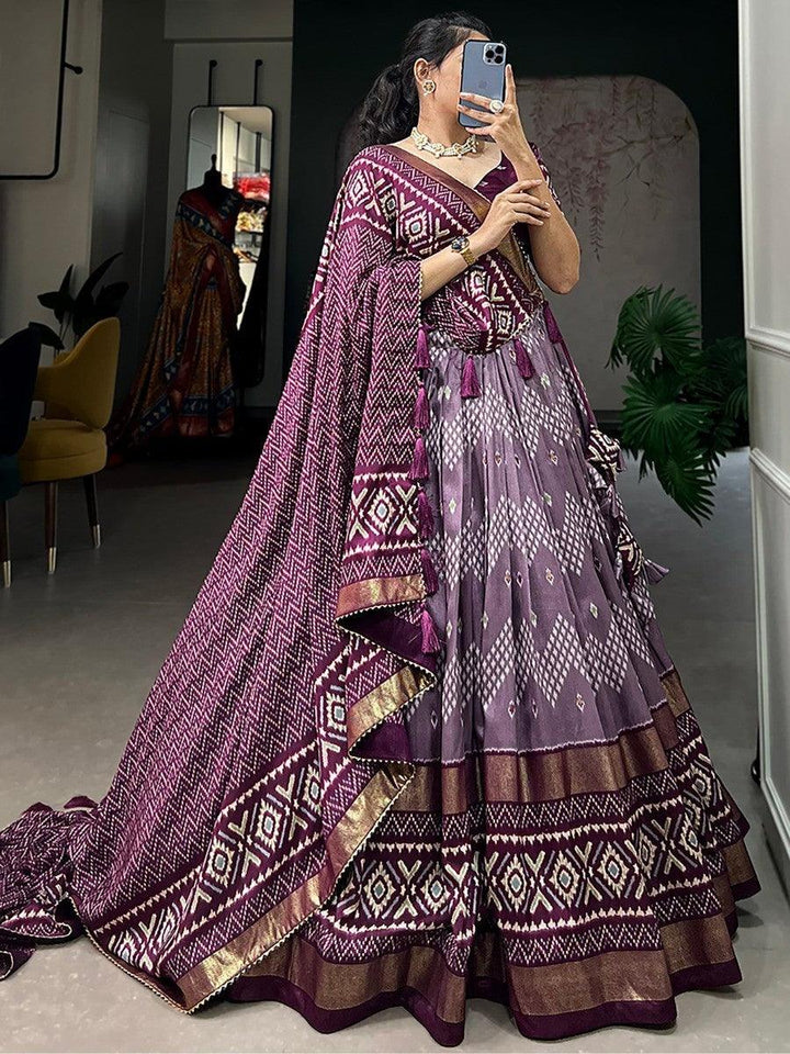Exquisite Wine Ikat Print Silk Navratri Wear Lehenga Choli With Dupatta