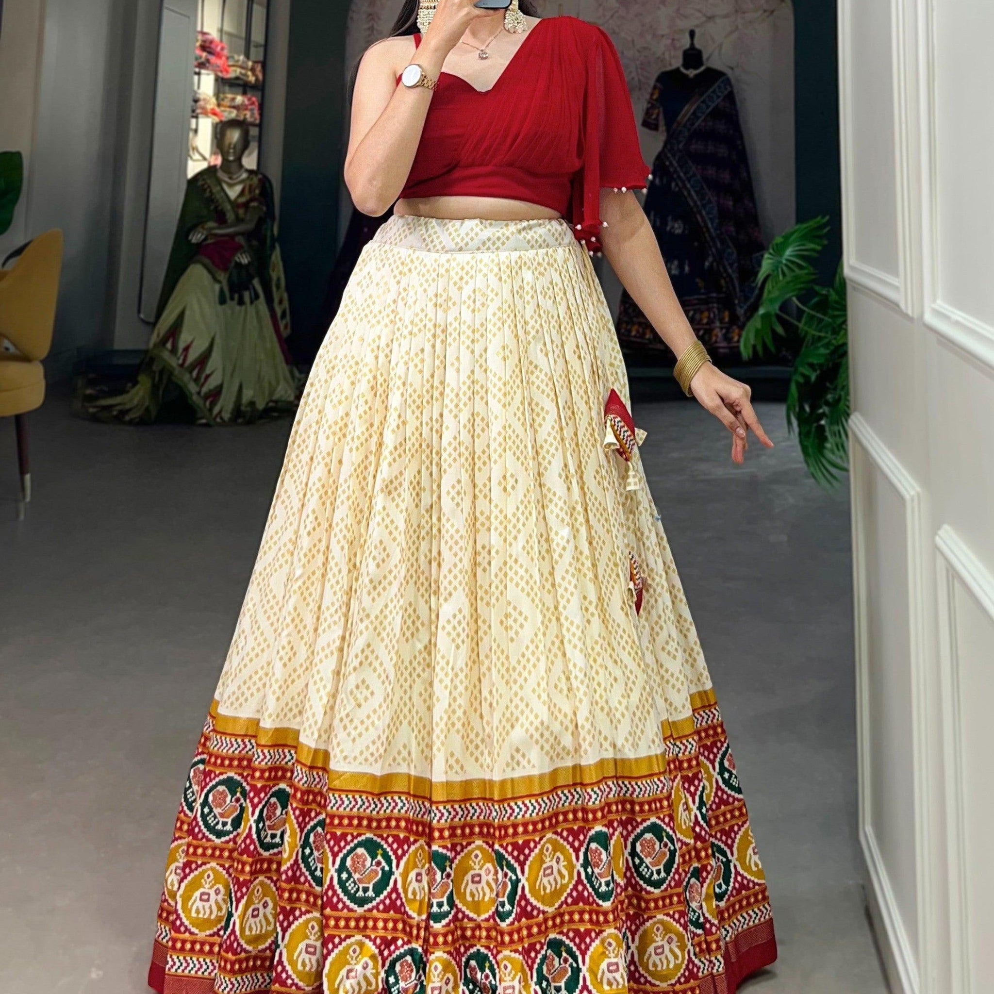 Glamorous Cream Patola Printed Silk Festival Wear Crop Top Lehenga