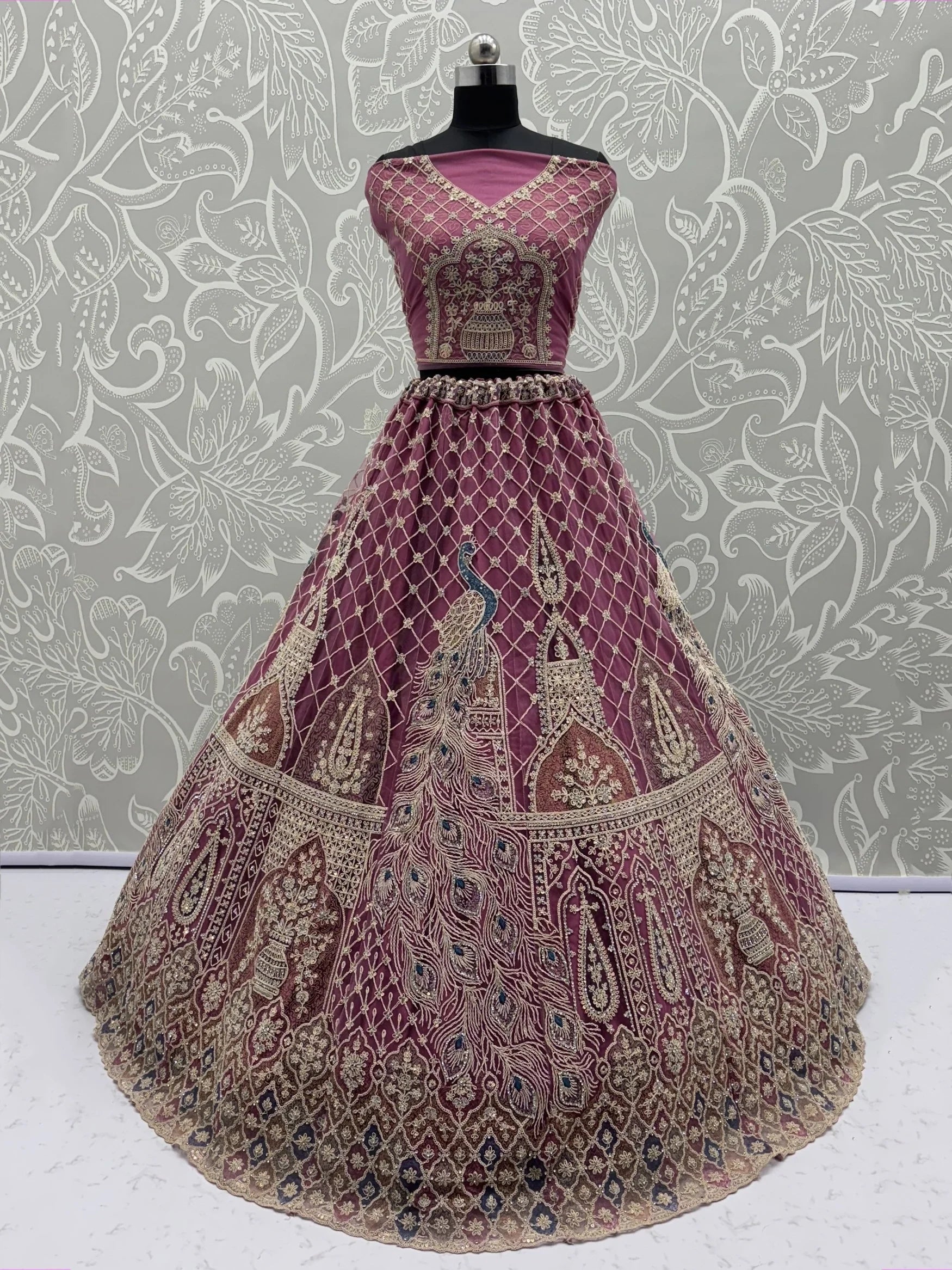 Lovable Pink Multi Thread Work Net Reception Wear Lehenga Choli With Dupatta