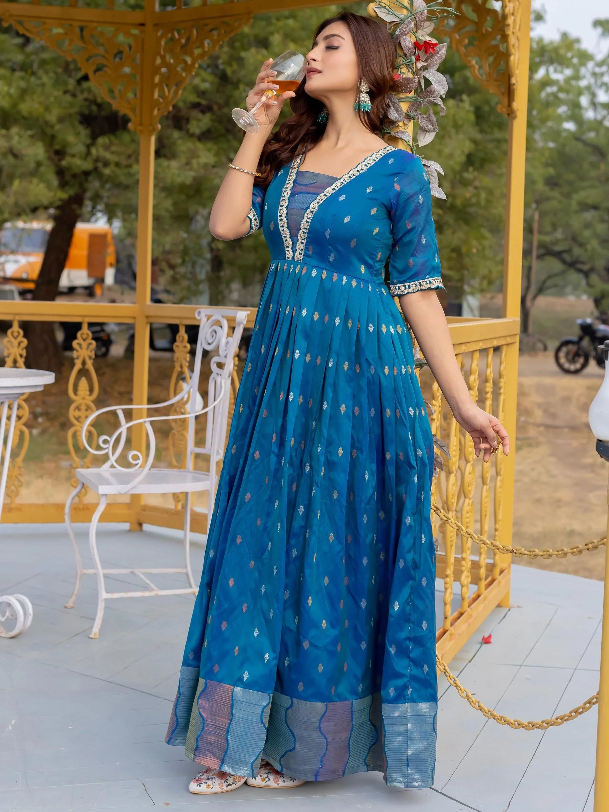Lovable Teal Blue Zari Weaving Silk Event Wear Gown - Zeel Clothing