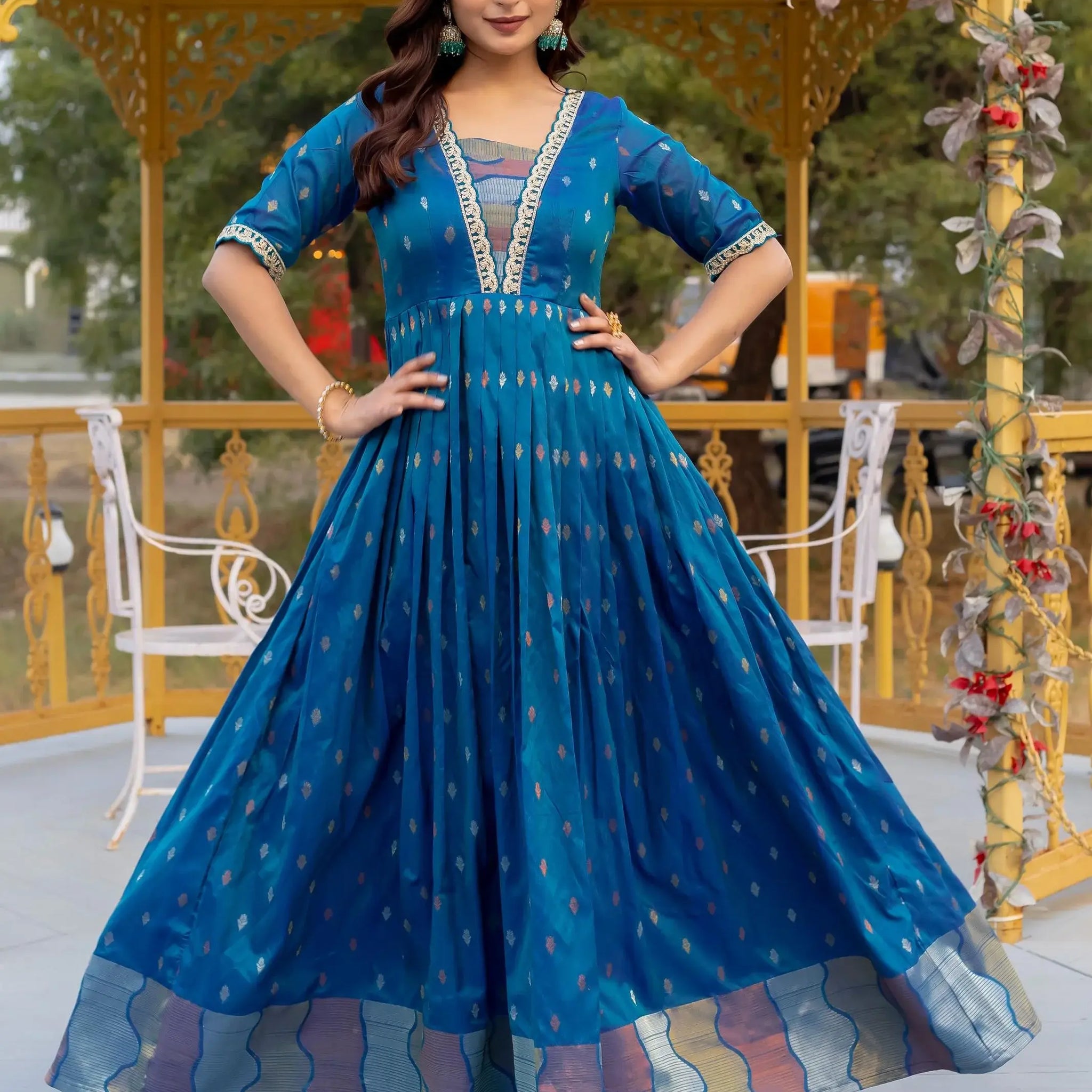 Lovable Teal Blue Zari Weaving Silk Event Wear Gown - Zeel Clothing