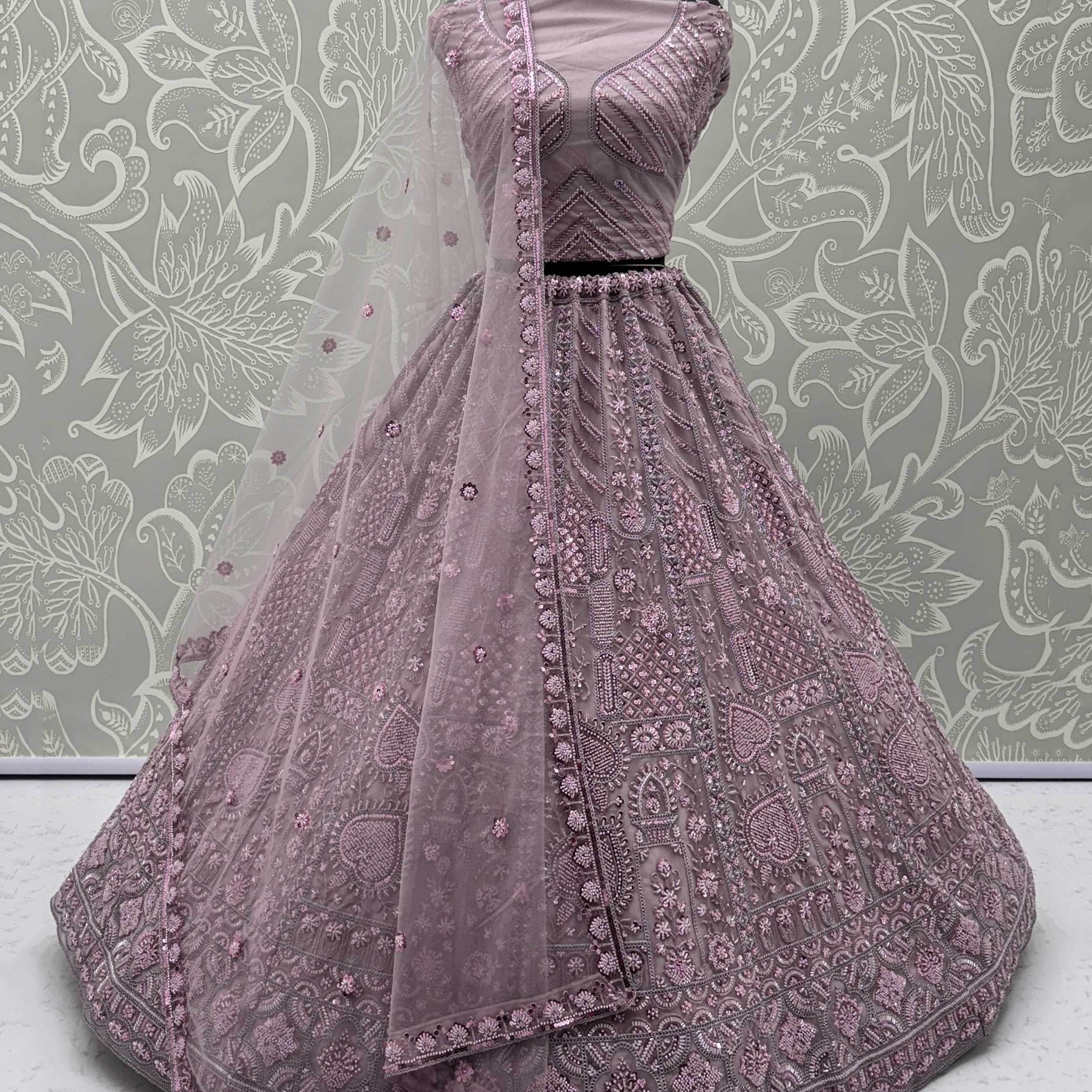 Lovely Lilac Thread Embroidered Net Monochrome Lehenga Choli With Dupatta - Zeel Clothing