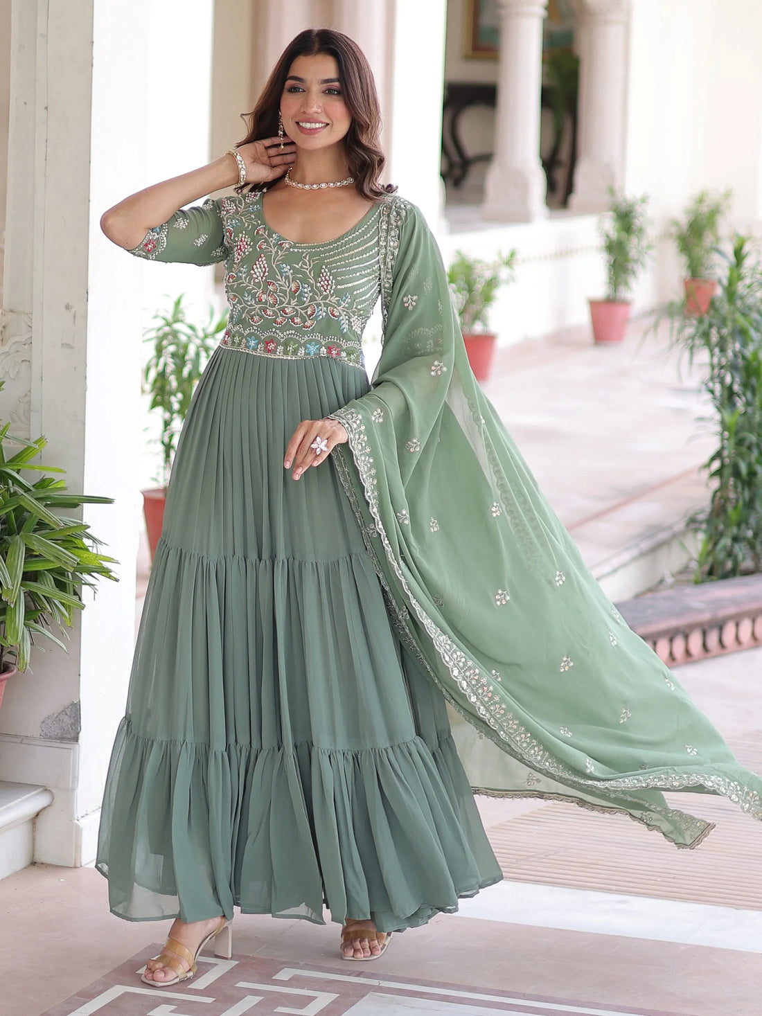 Lovely Pista Green Sequins Georgette Mehendi Wear Gown With Dupatta