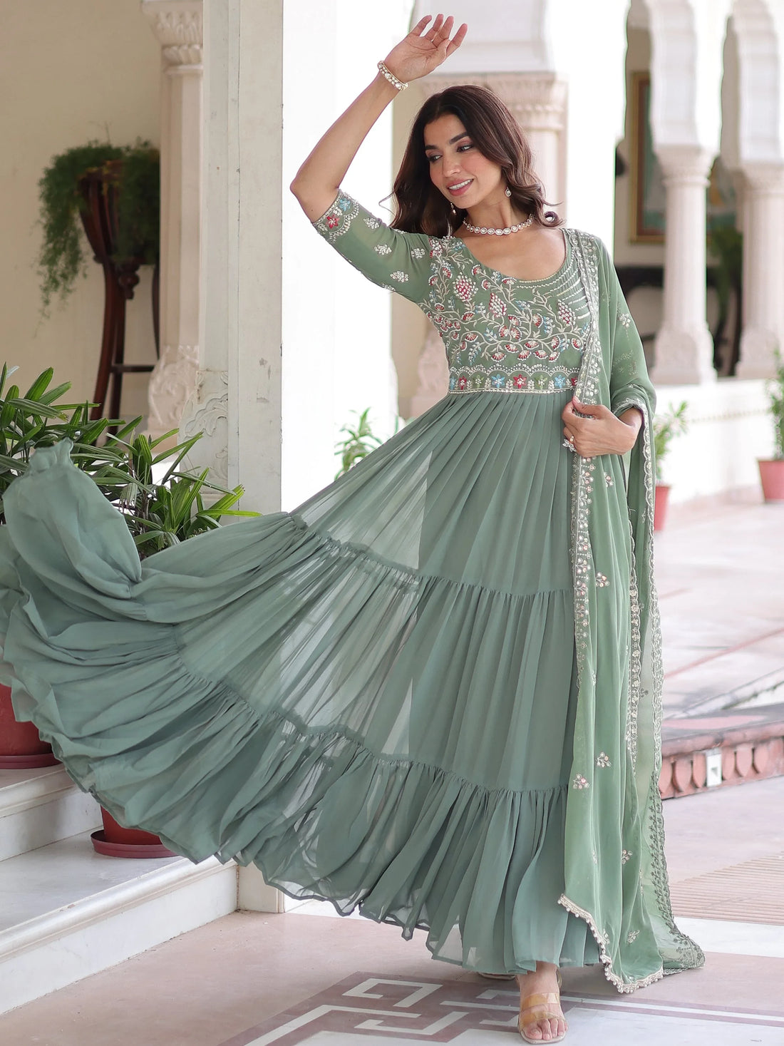 Lovely Pista Green Sequins Georgette Mehendi Wear Gown With Dupatta