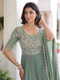 Lovely Pista Green Sequins Georgette Mehendi Wear Gown With Dupatta