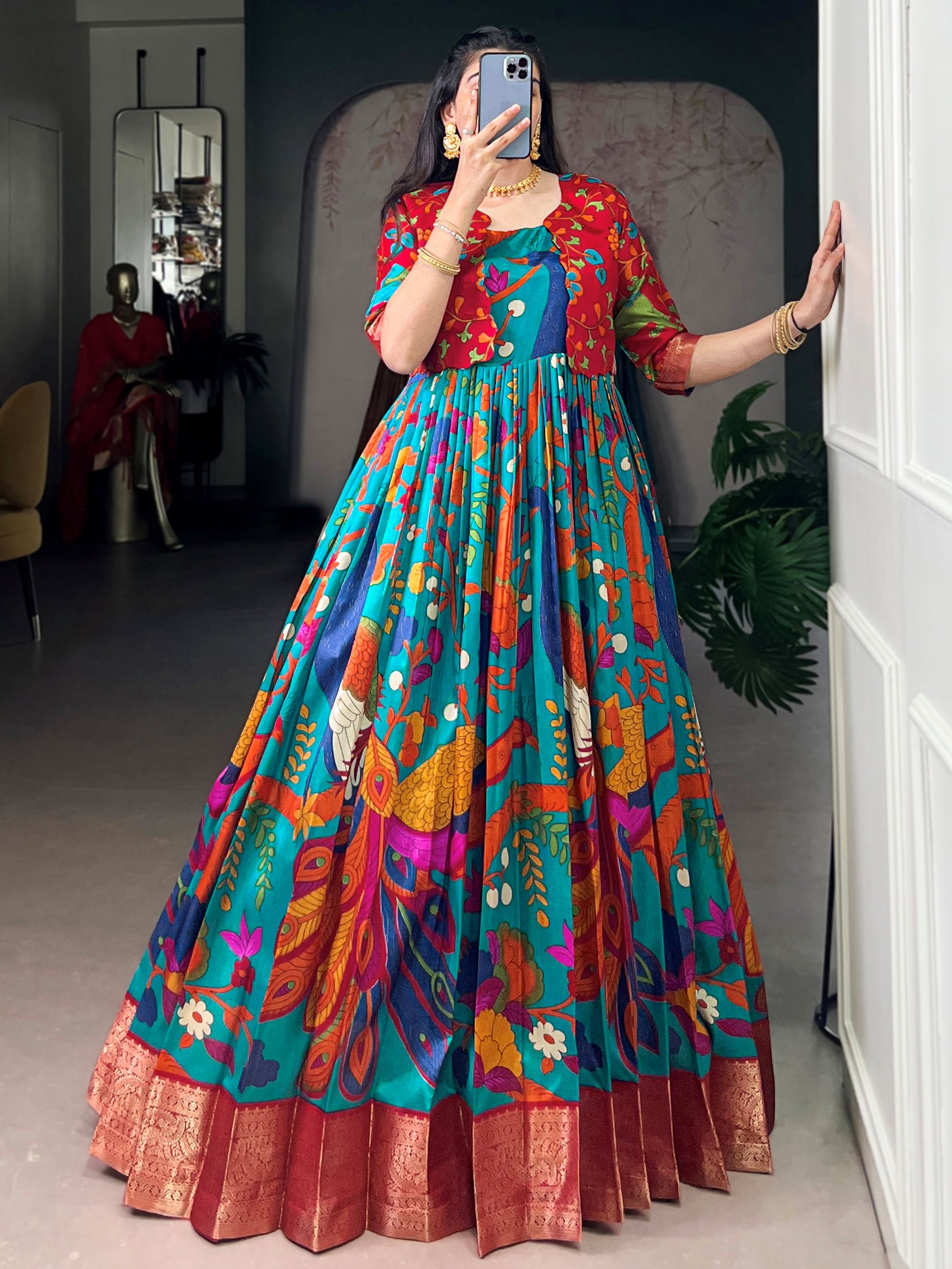 Lovely Teal Blue Kalamkari Print Tussar Silk Festive Wear Gown With Jacket